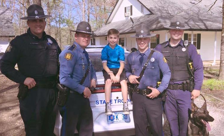 Toxey meets the Arkansas State Troopers for the first time.