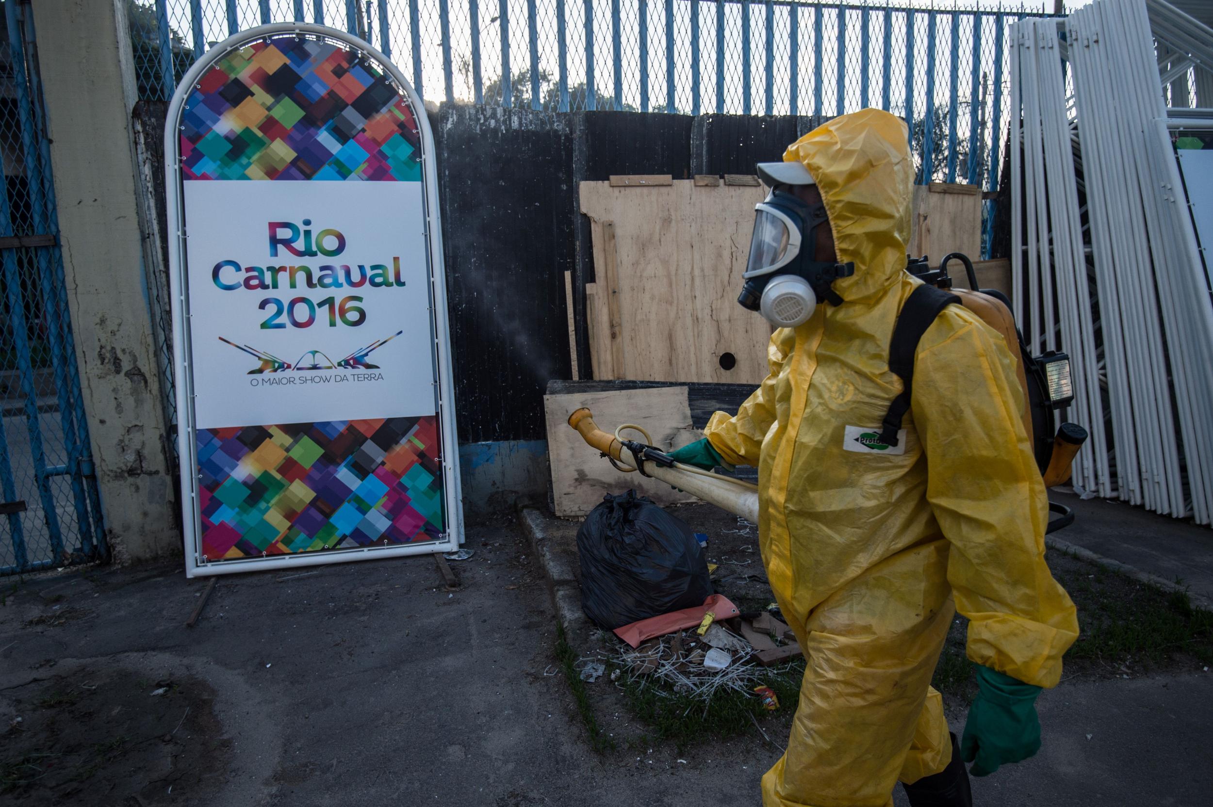 A worker sprays an anti-mosquito agent in Rio de Janeiro to combat the Zika virus