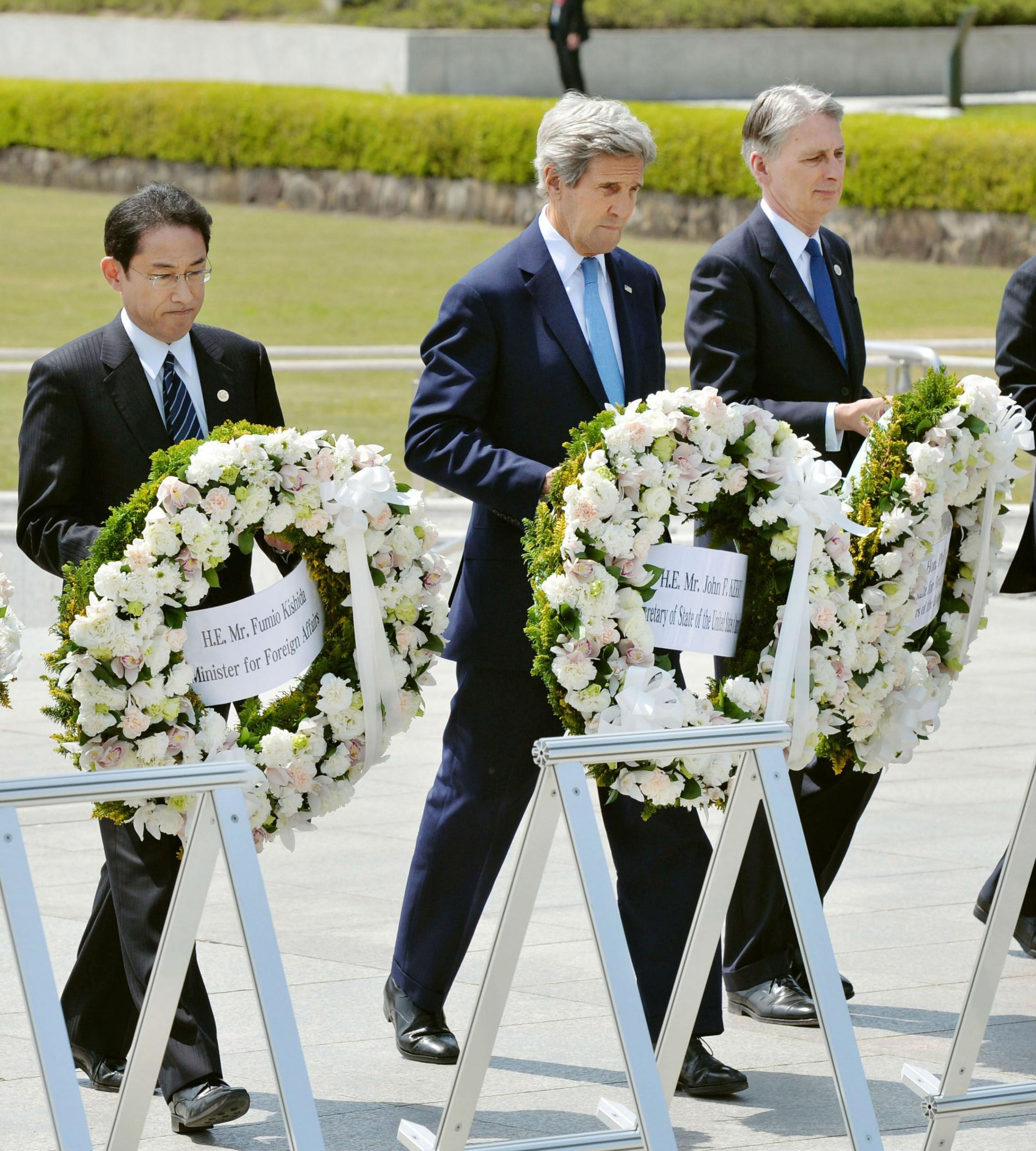 Mr Kerry wrote in the museum guestbook that it was a 'stark' reminder of the need to end the threat of nuclear war