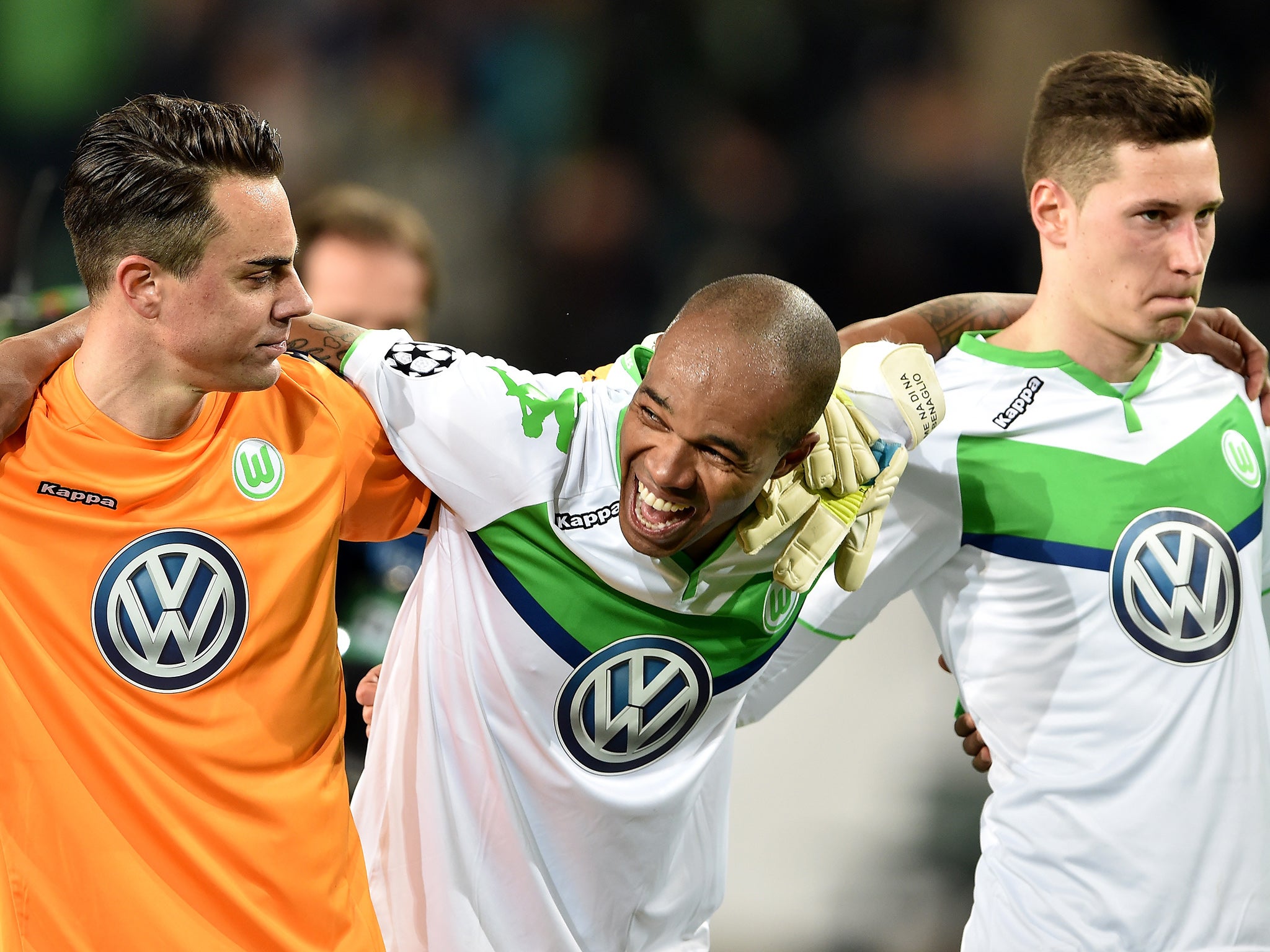 Diego Benaglio, Naldo and Julian Draxler celebrate last week's first-leg win