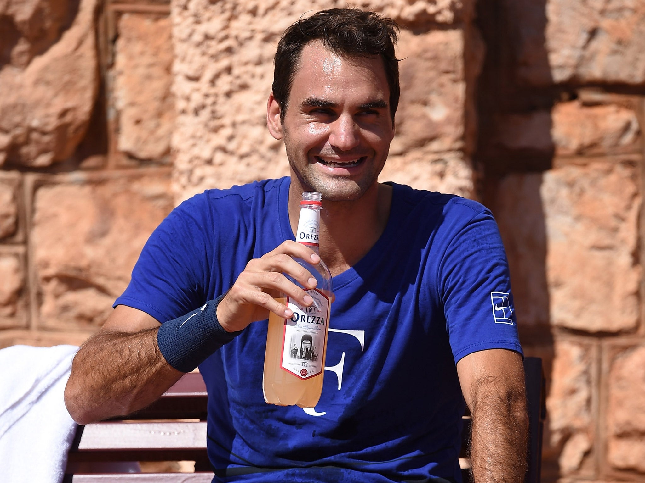 Roger Federer relaxes during a training session in Monte Carlo