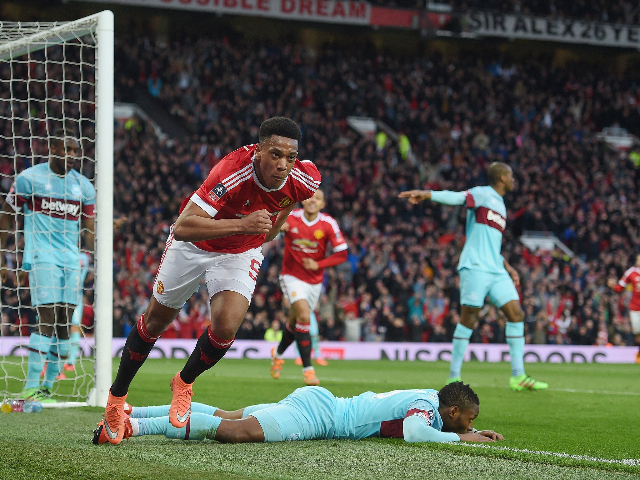 Anthony Martial celebrates after scoring against West Ham