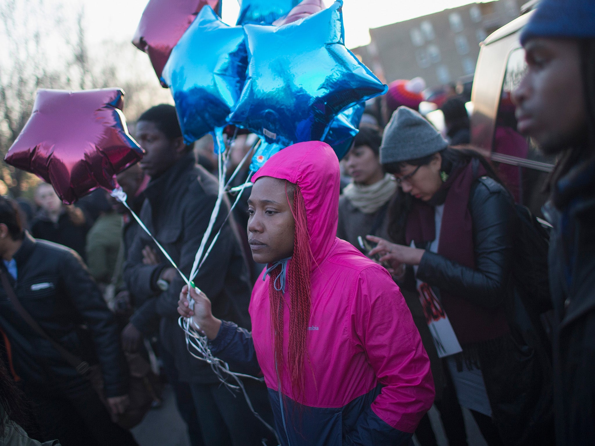 Demonstrators protest the shooting death of 16-year-old Pierre Loury