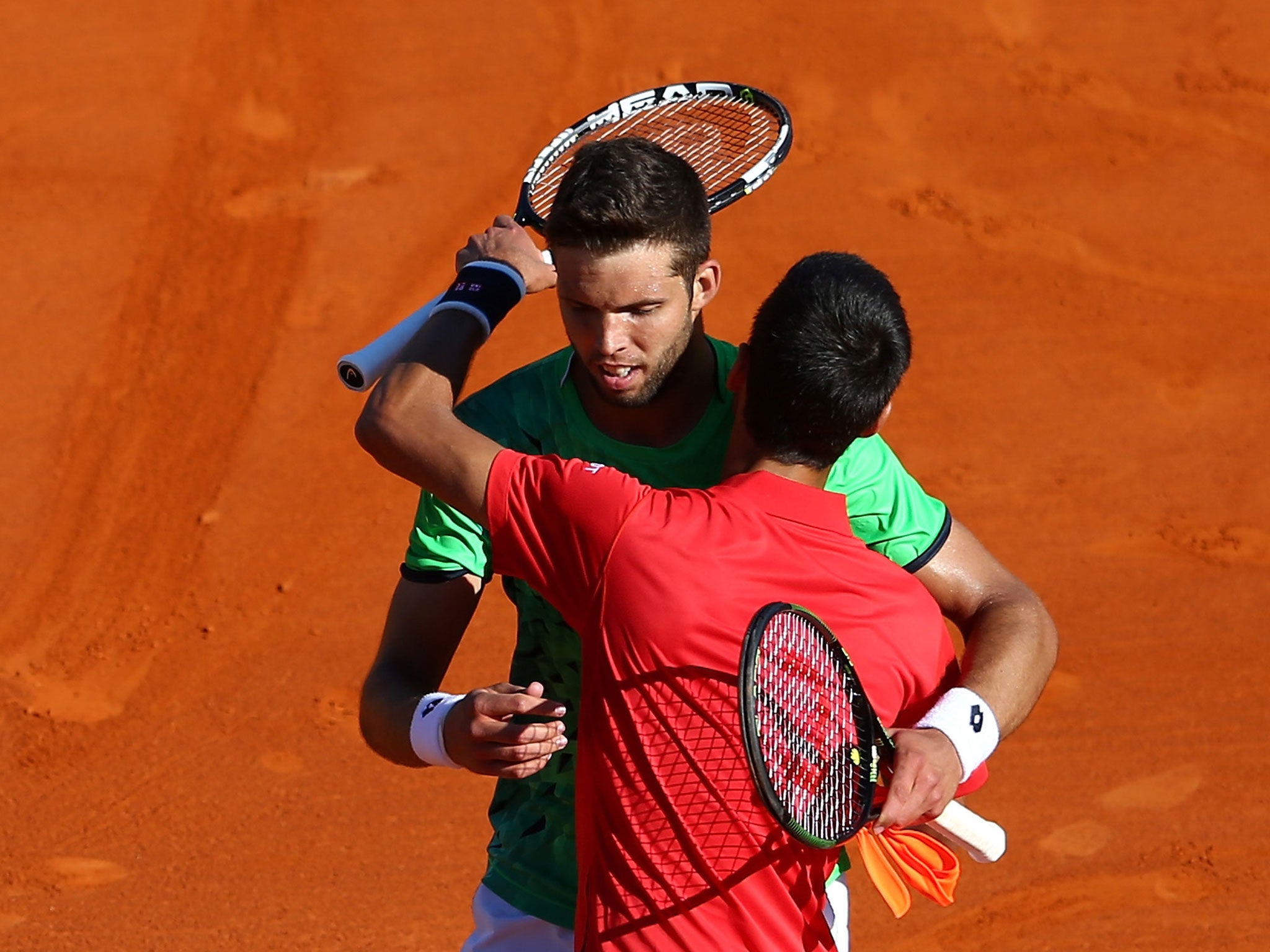 Novak Djokovic congratulates Jiri Vesely