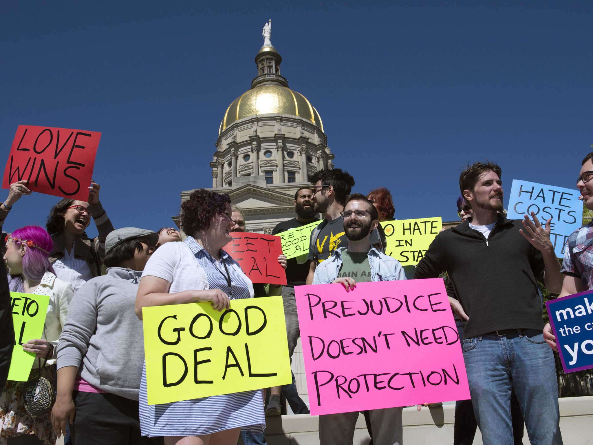 Georgia residents celebrate landmark veto by Gov Nathan Deal Rex