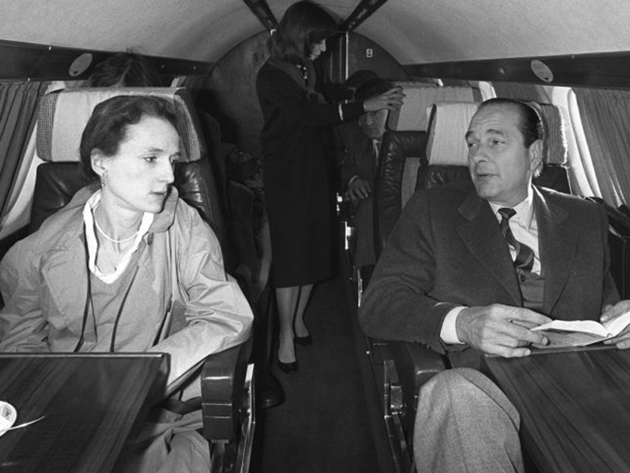 French politician Jacques Chirac (R) talking with his daughter Laurence (L) in a plane heading to Sarran to vote for the first round of the 1981 presidential election.