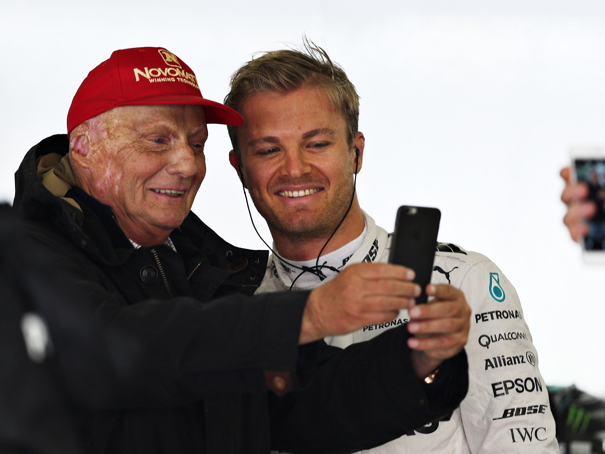 Mercedes non-executive chairman Niki Lauda takes a selfie with Nico Rosberg