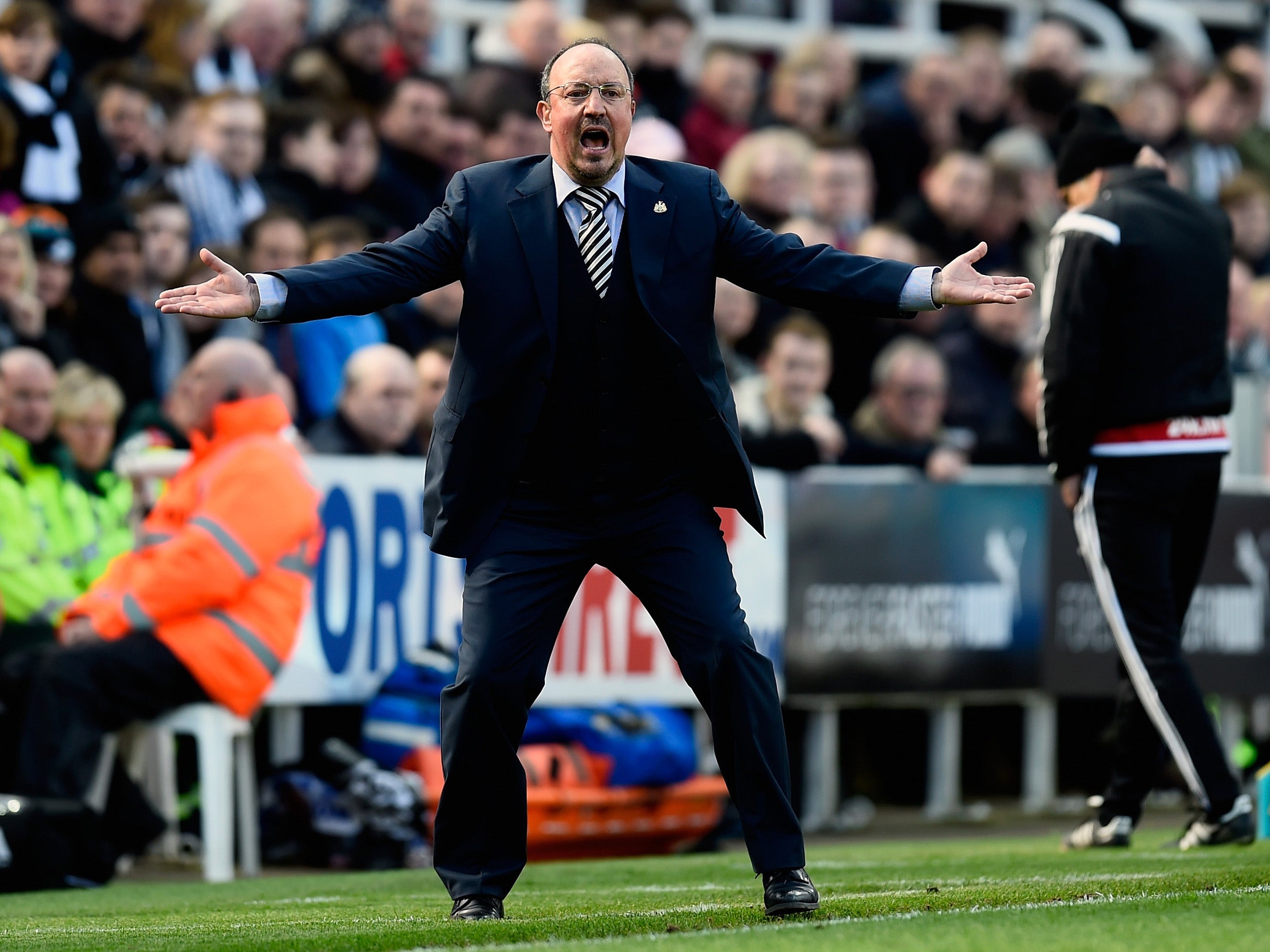 Rafa Benitez gestures during his side's 3-0 victory against Swansea