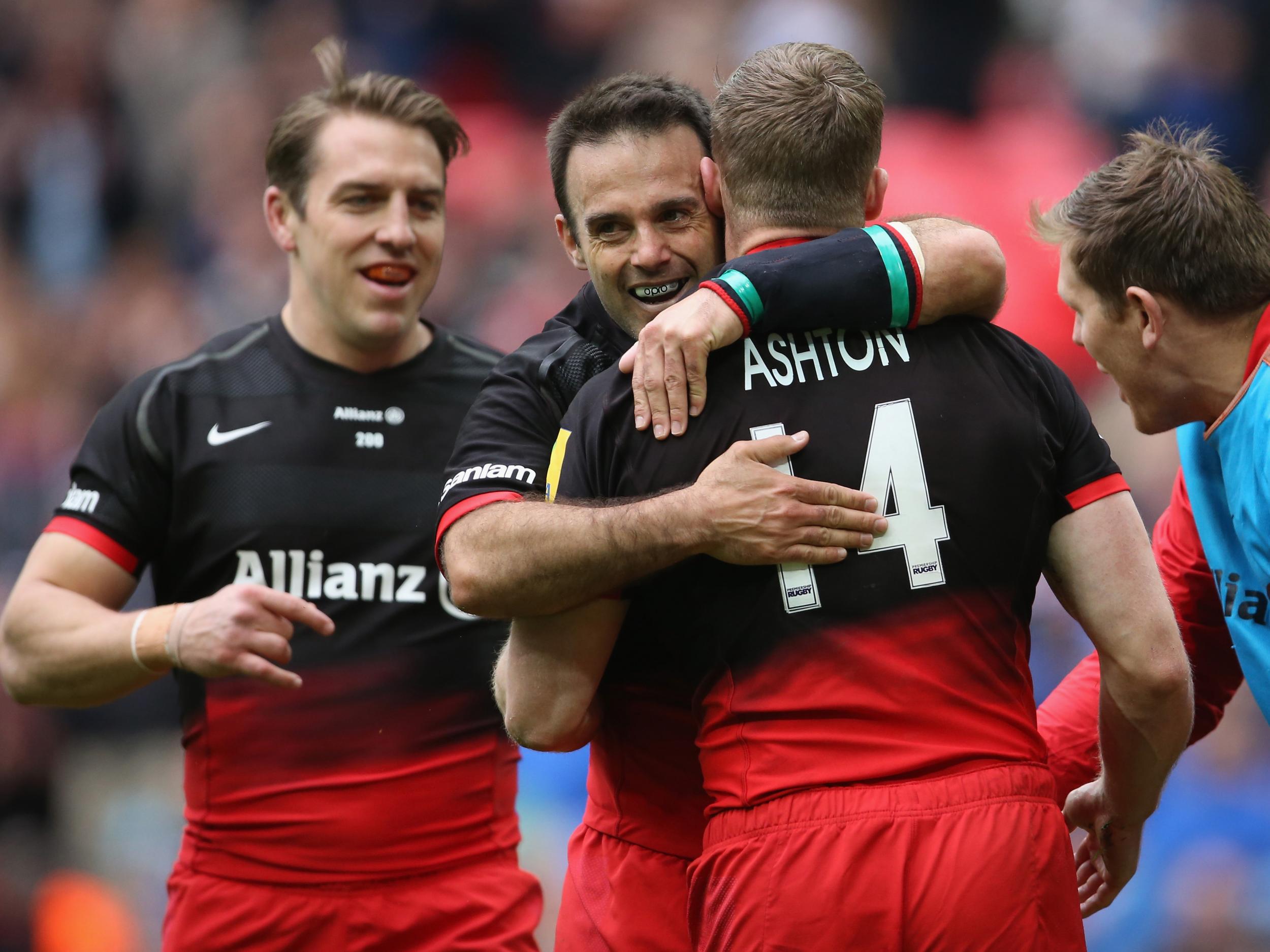 Chris Ashton is congratulated by his team-mates