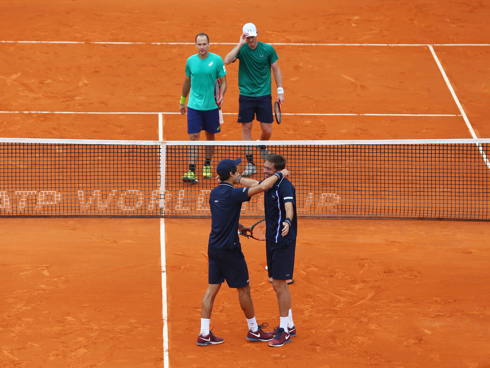 Nicolas Mahut and Pierre-Hugues Herbert celebrate victory