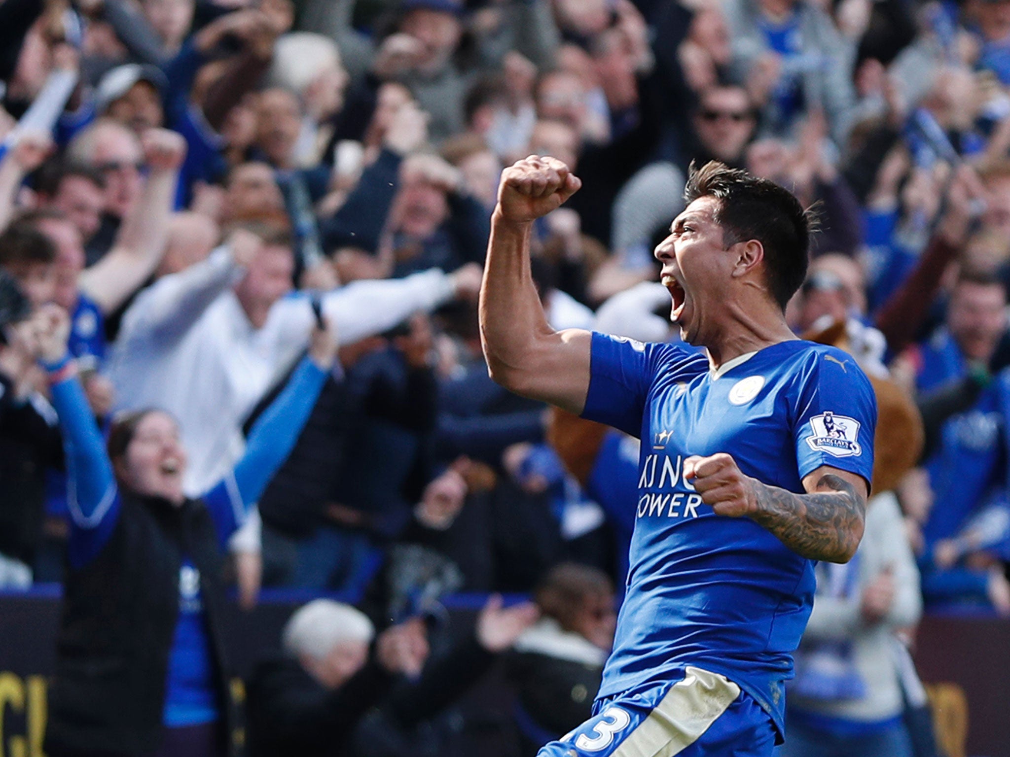 Leonardo Ulloa celebrates scoring a penalty