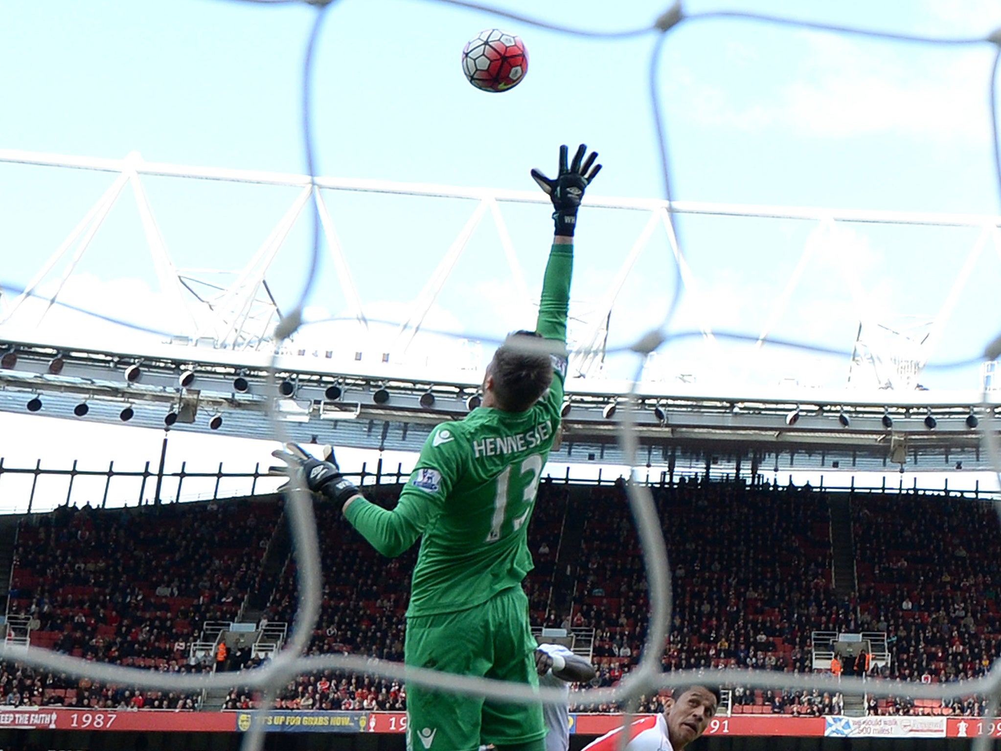 Alexis Sanchez loops his header over Wayne Hennessey