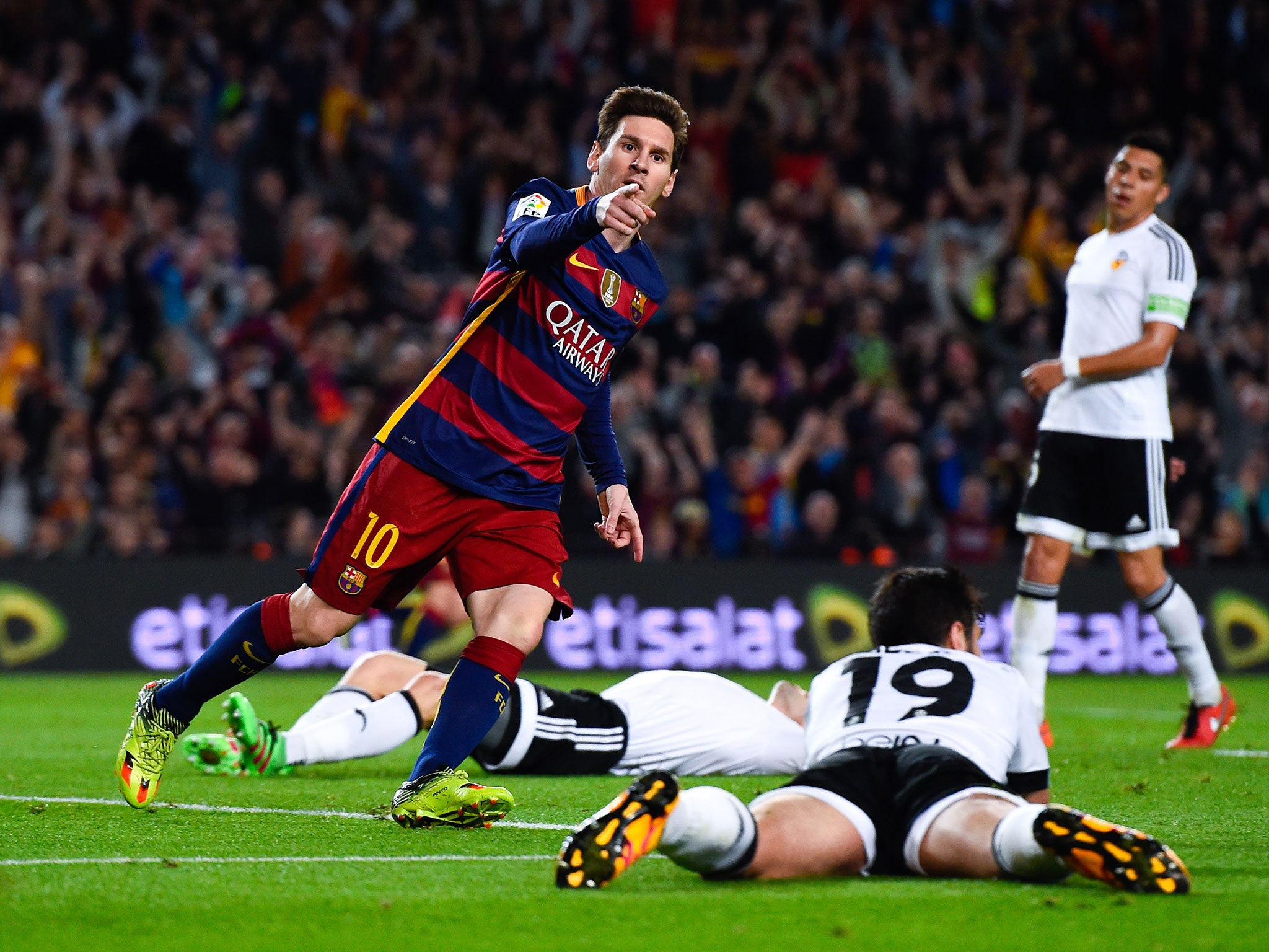 Lionel Messi celebrates scoring his 500th career goal