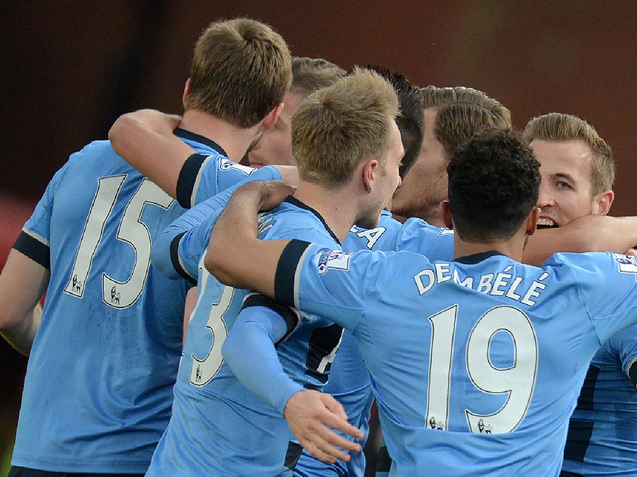 Tottenham celebrate after Harry Kane scores against Stoke