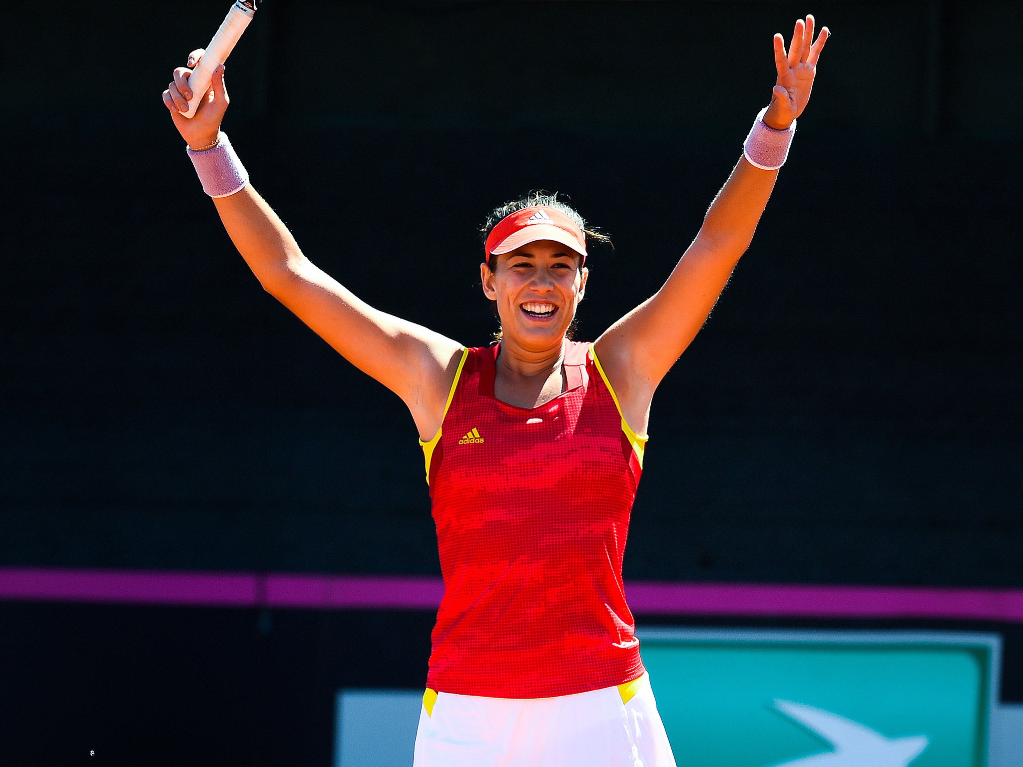 &#13;
Muguruza won both her singles matches in the Fed Cup clash with Italy &#13;