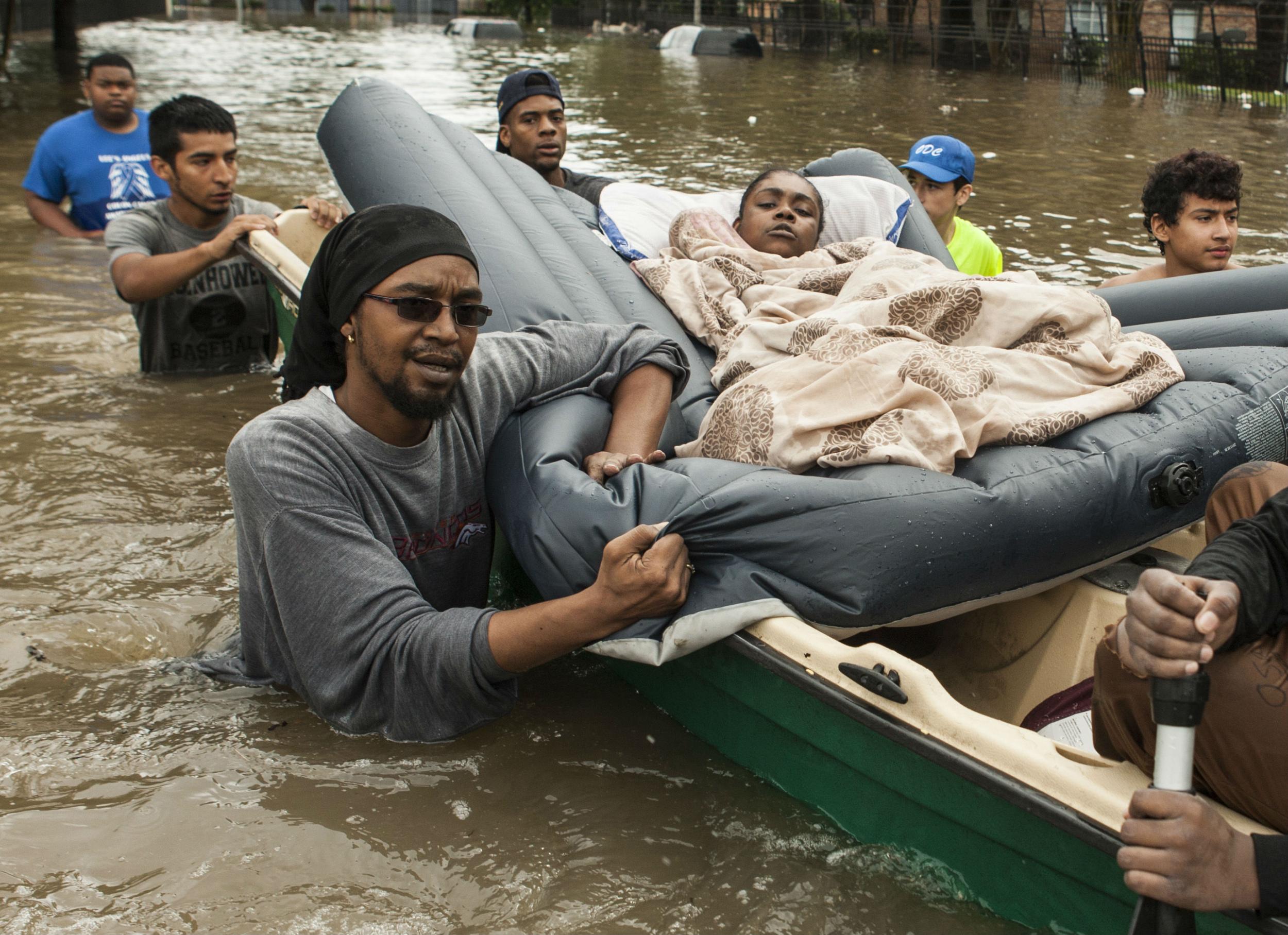 Residents flee their homes amid fears of further flooding