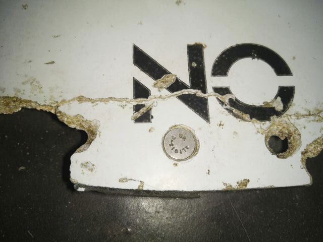One of the pieces of debris confirmed to come from MH370 by the Australian Transport Safety Bureau
