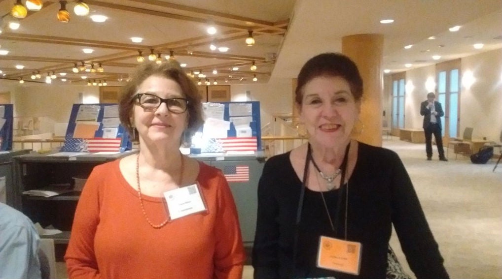 Carol Winer and Juliette Feffer handed Mr Trump his ballot card