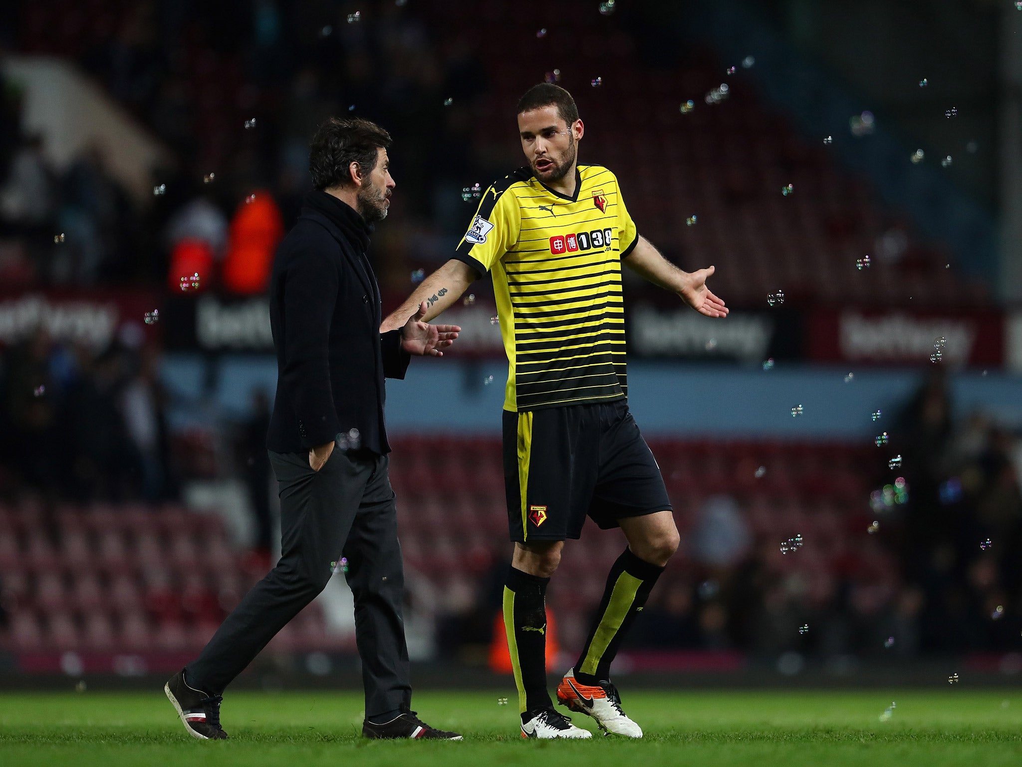 Mario Suarez speaks with Flores following defeat by West Ham