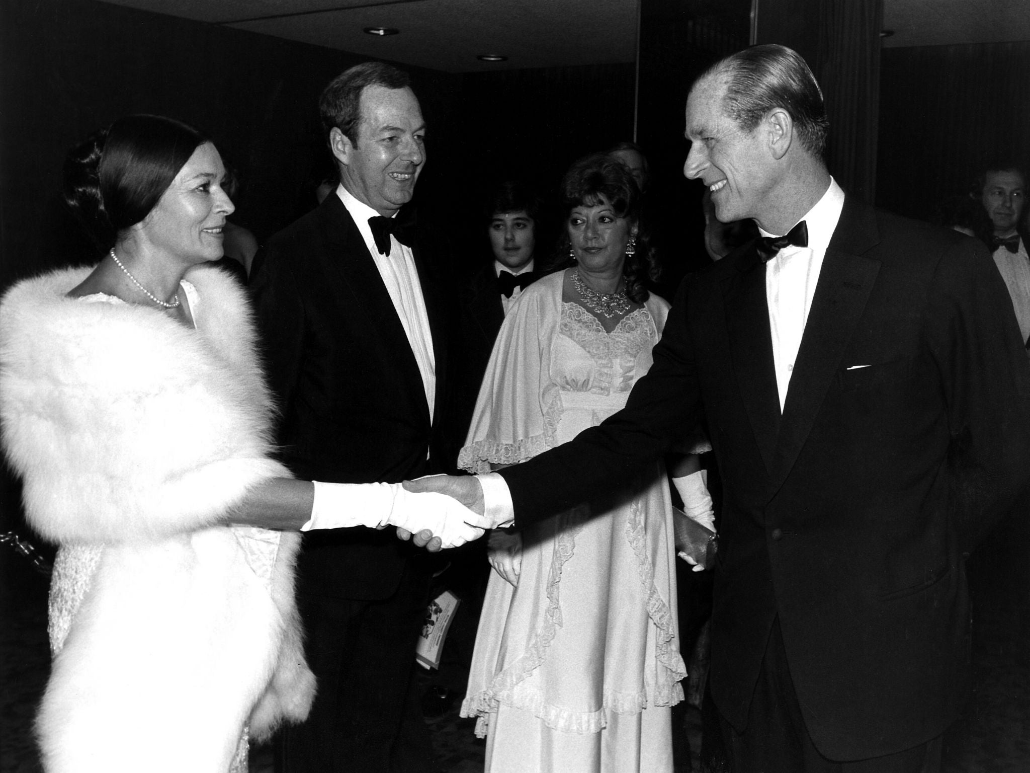 Kemira and Guy Hamilton meet Prince Philip at The Man With The Golden Gun premiere in 1974