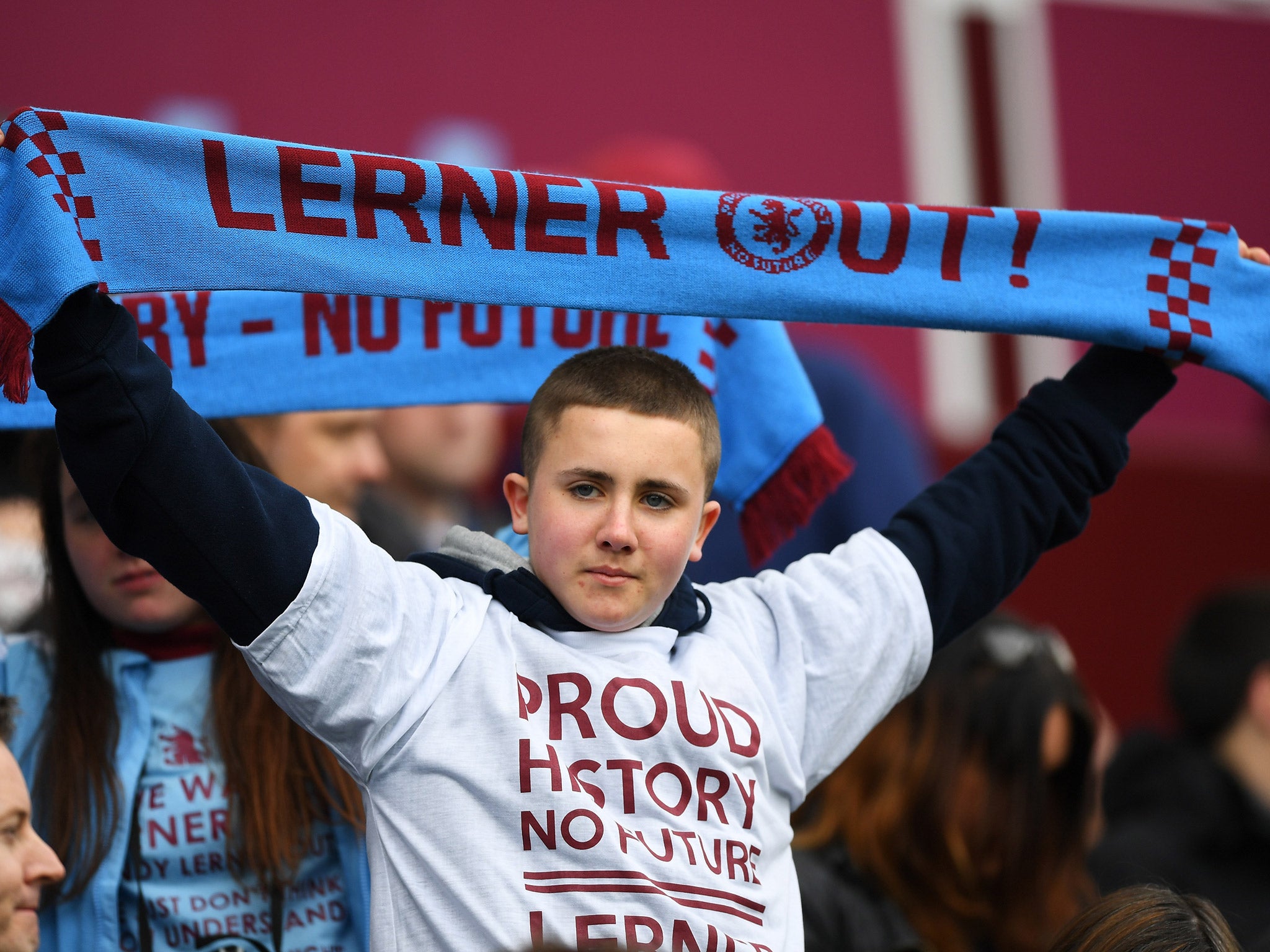 Aston Villa fans have protested against Randy Lerner