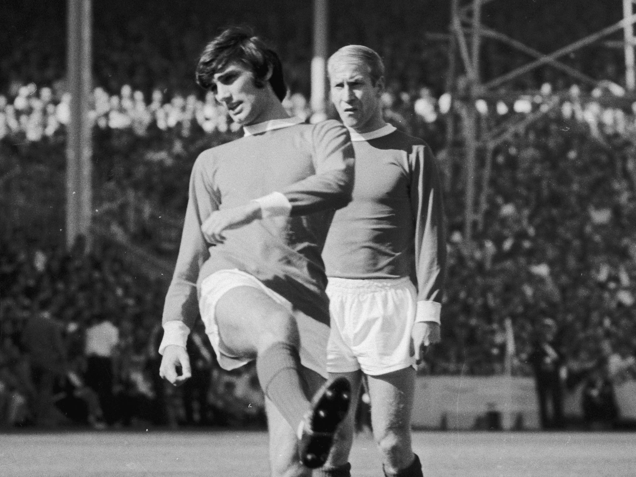 Best and Charlton in action for Manchester United in 1966