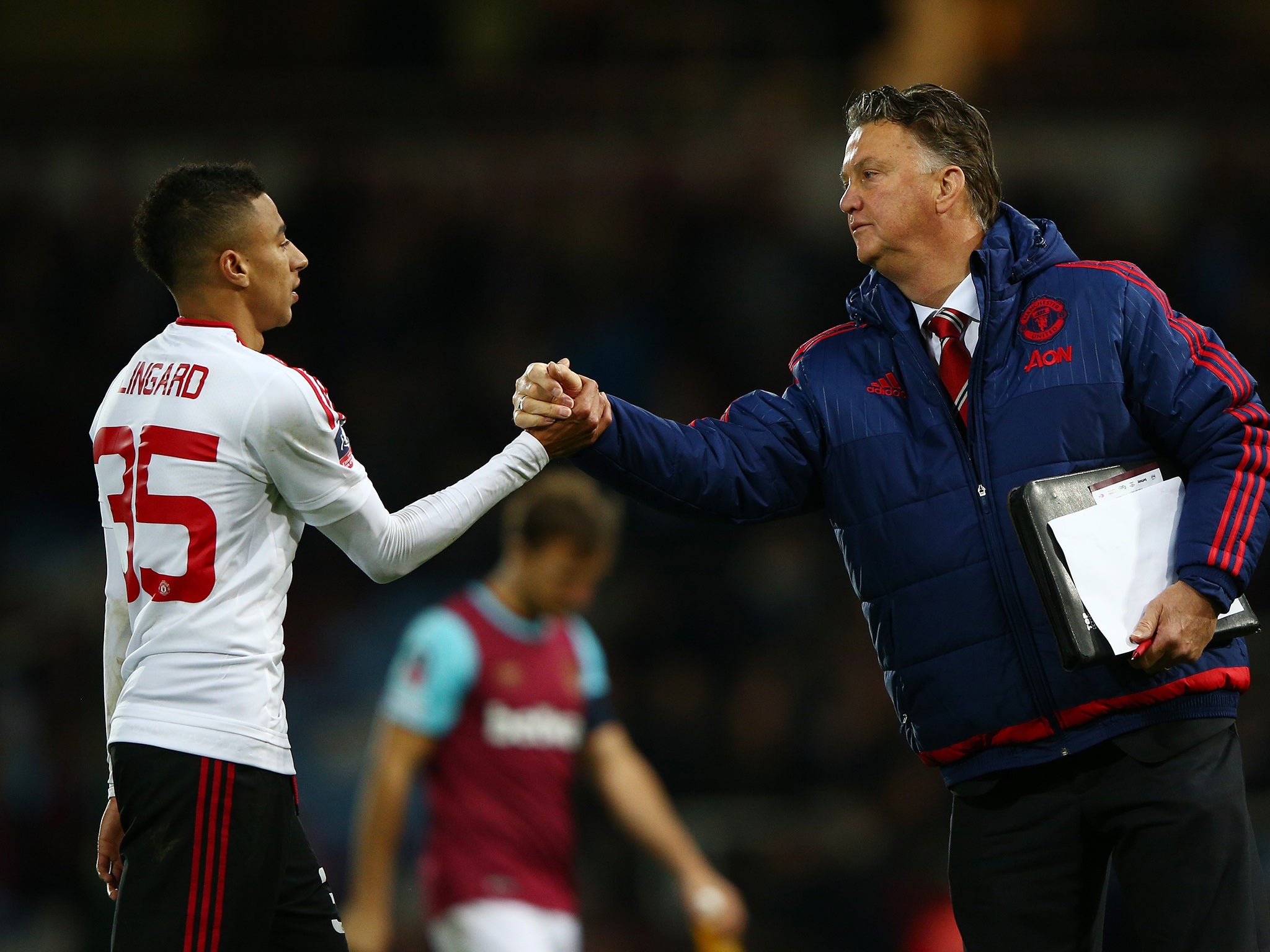 Jesse Lingard with manager Louis van Gaal