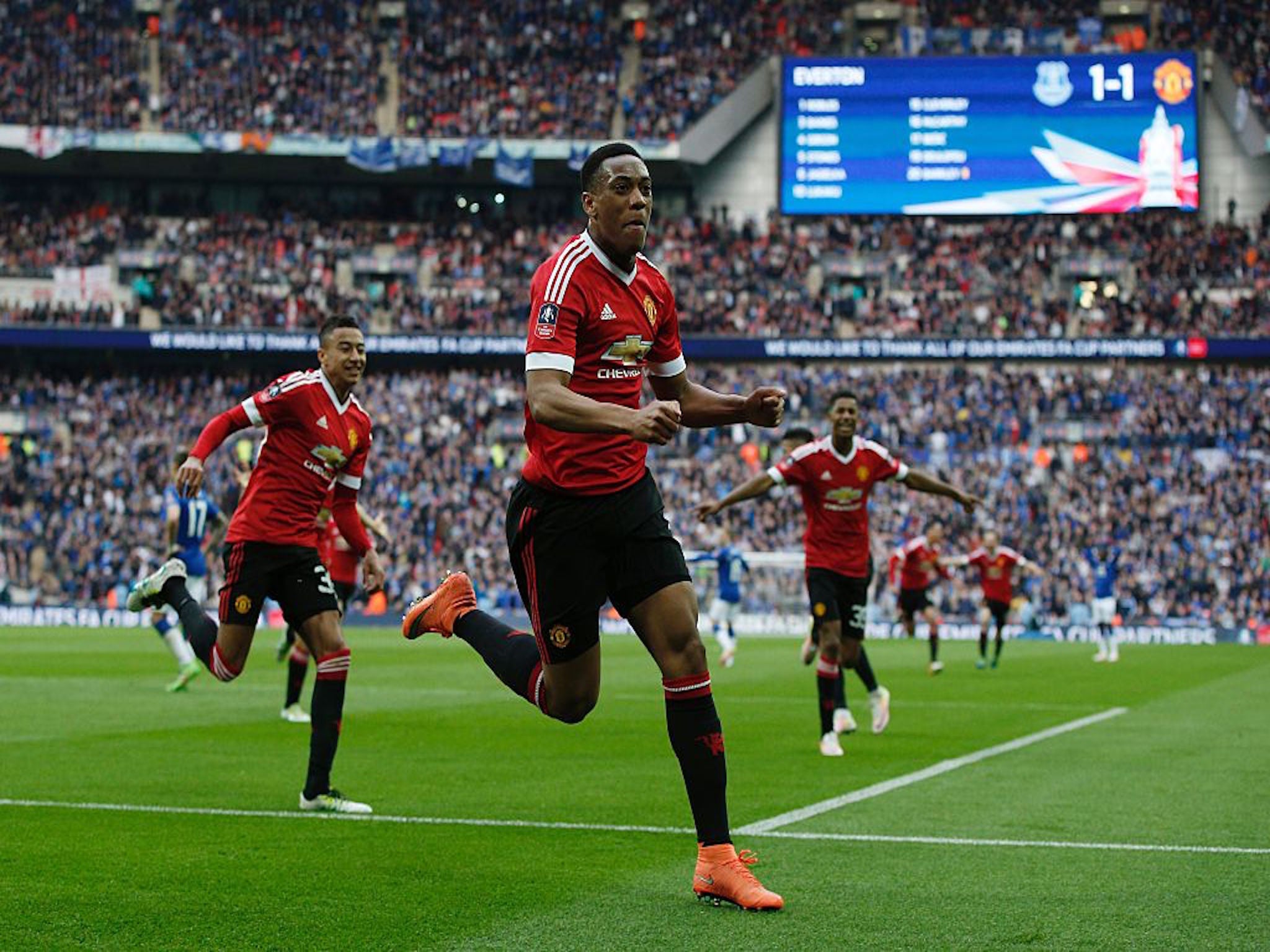 Anthony Martial wheels away after scoring Manchester United's 92nd minute winner against Everton