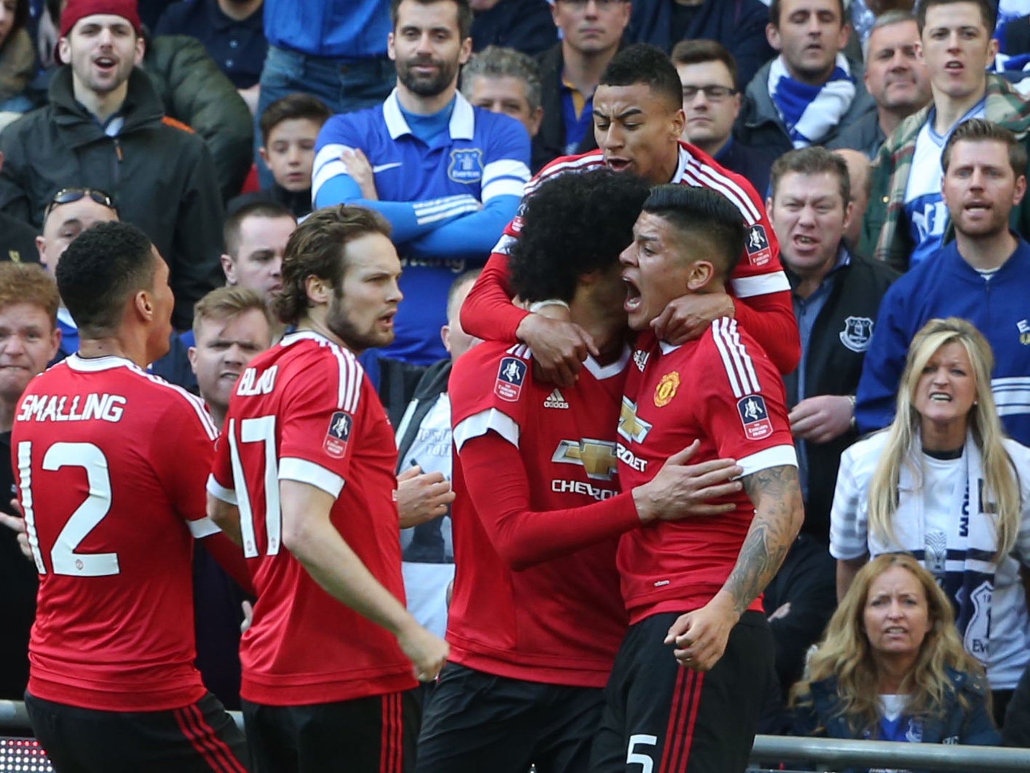 Marouane Fellaini celebrates putting United in front