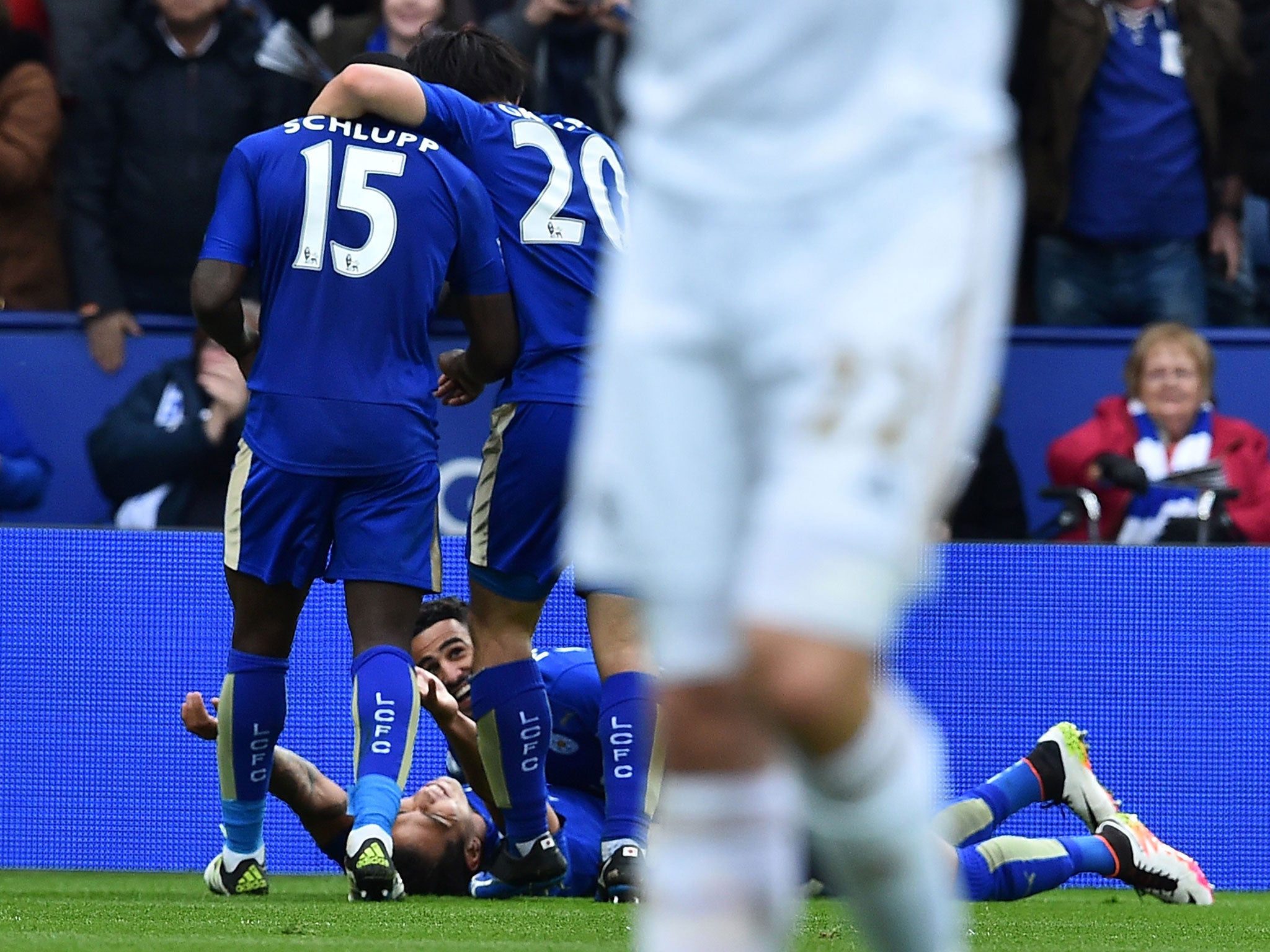 Leonardo Ulloa celebrates after scoring one of his two goals