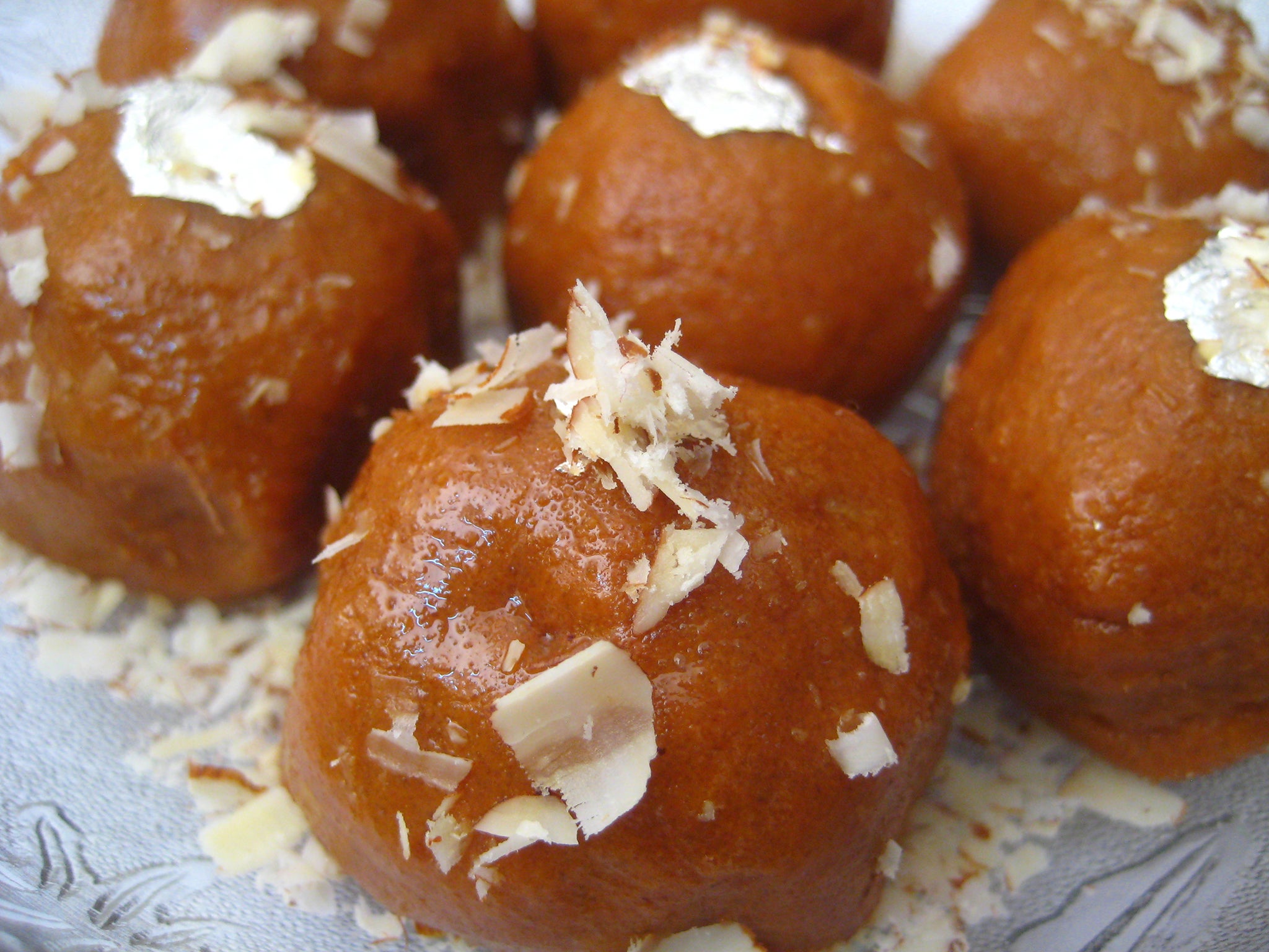 Laddoos are popular sweets made with flour, minced dough and sugar