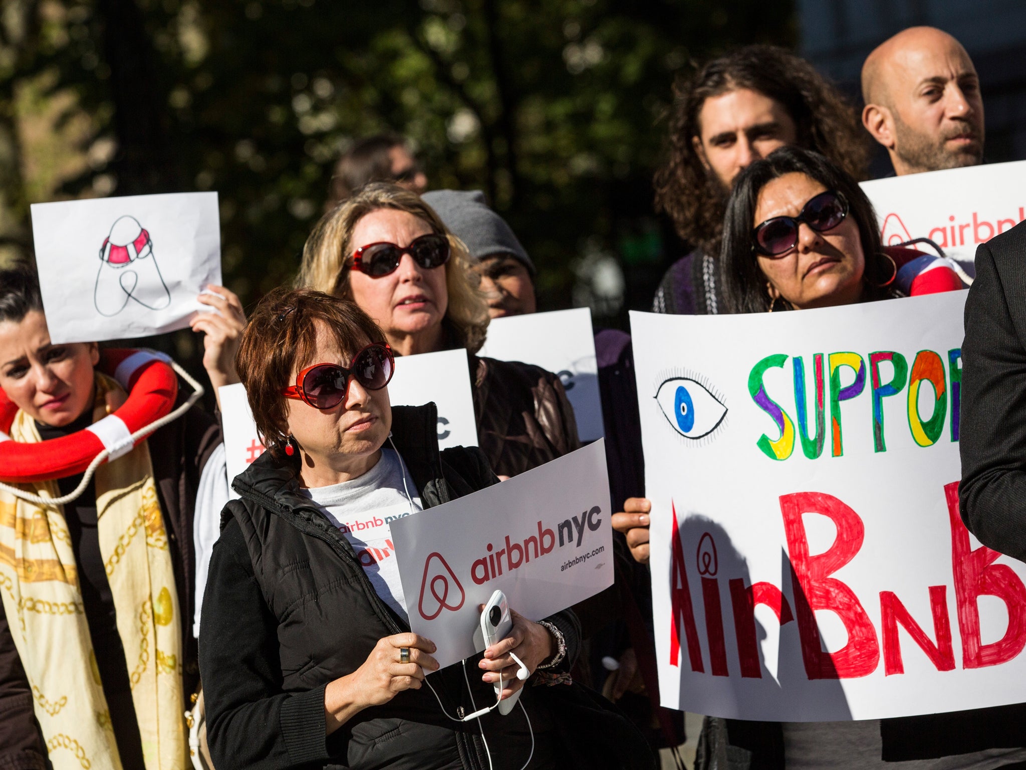 New Yorkers show their support for Airbnb outside 30 October City Council hearing Andrew Burton/Getty