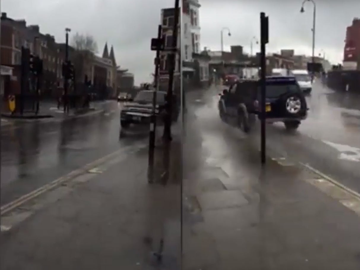 The puddle splasher was filmed driving in heavy rain in Kentish Town