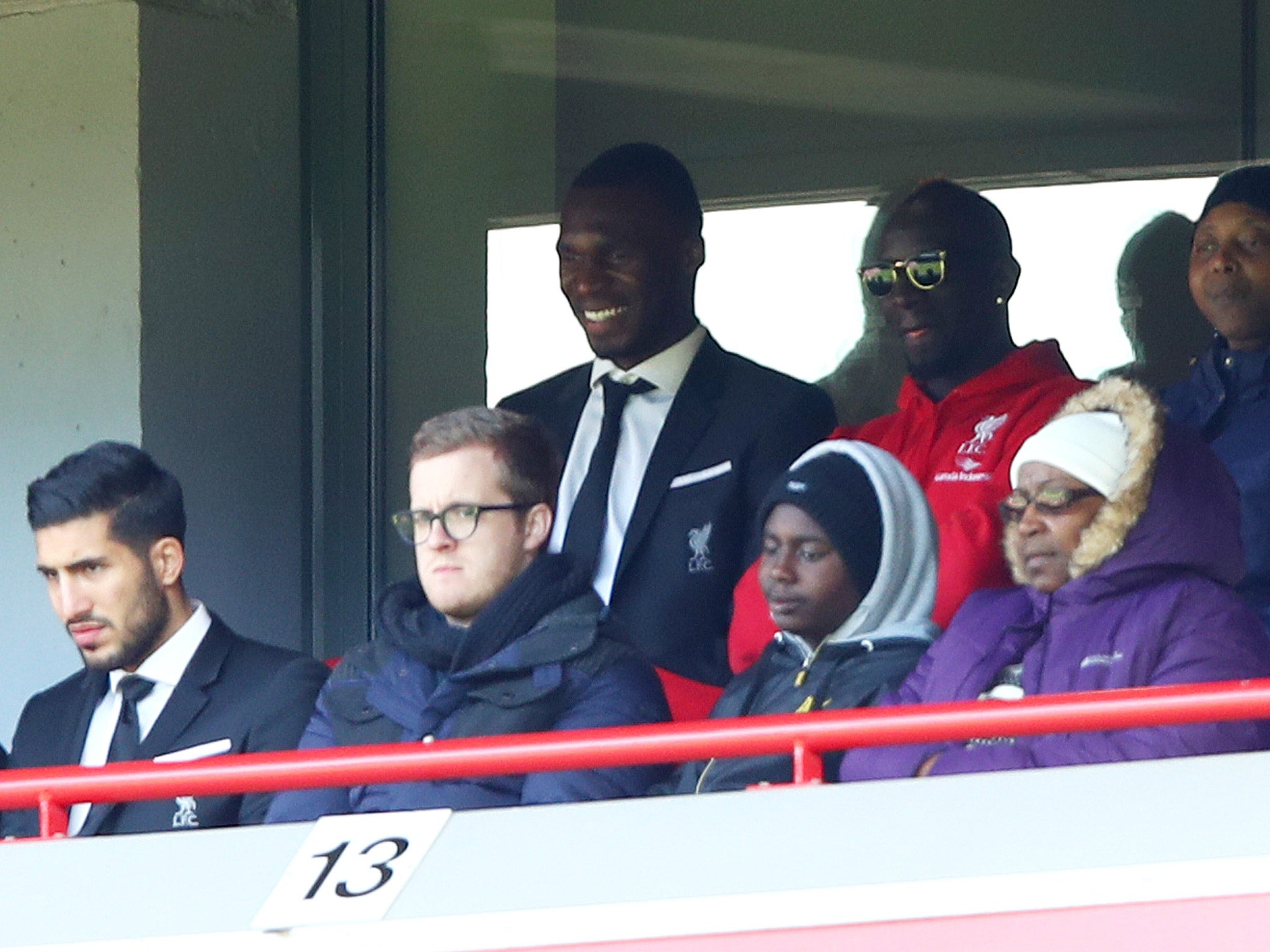 Liverpool defender Mamadou Sakho (top right) missed the game with Newcastle after an alleged anti-doping violation