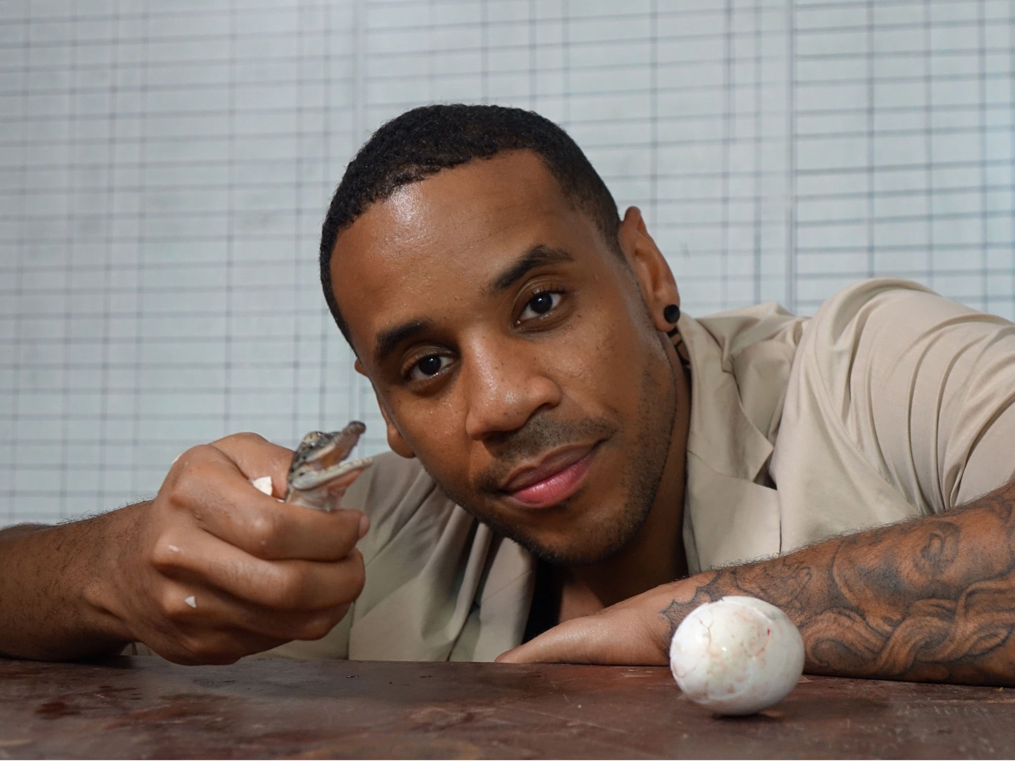 Reggie Yates visiting a crocodile farm in Australia