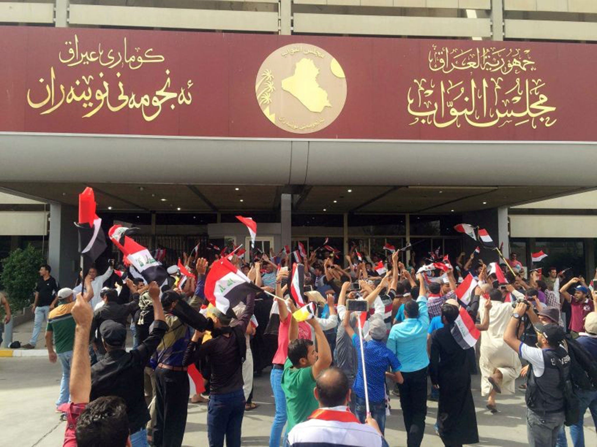 Followers of Shia cleric Muqtada al-Sadr outside the parliament building in Iraq on April 30, 2016.