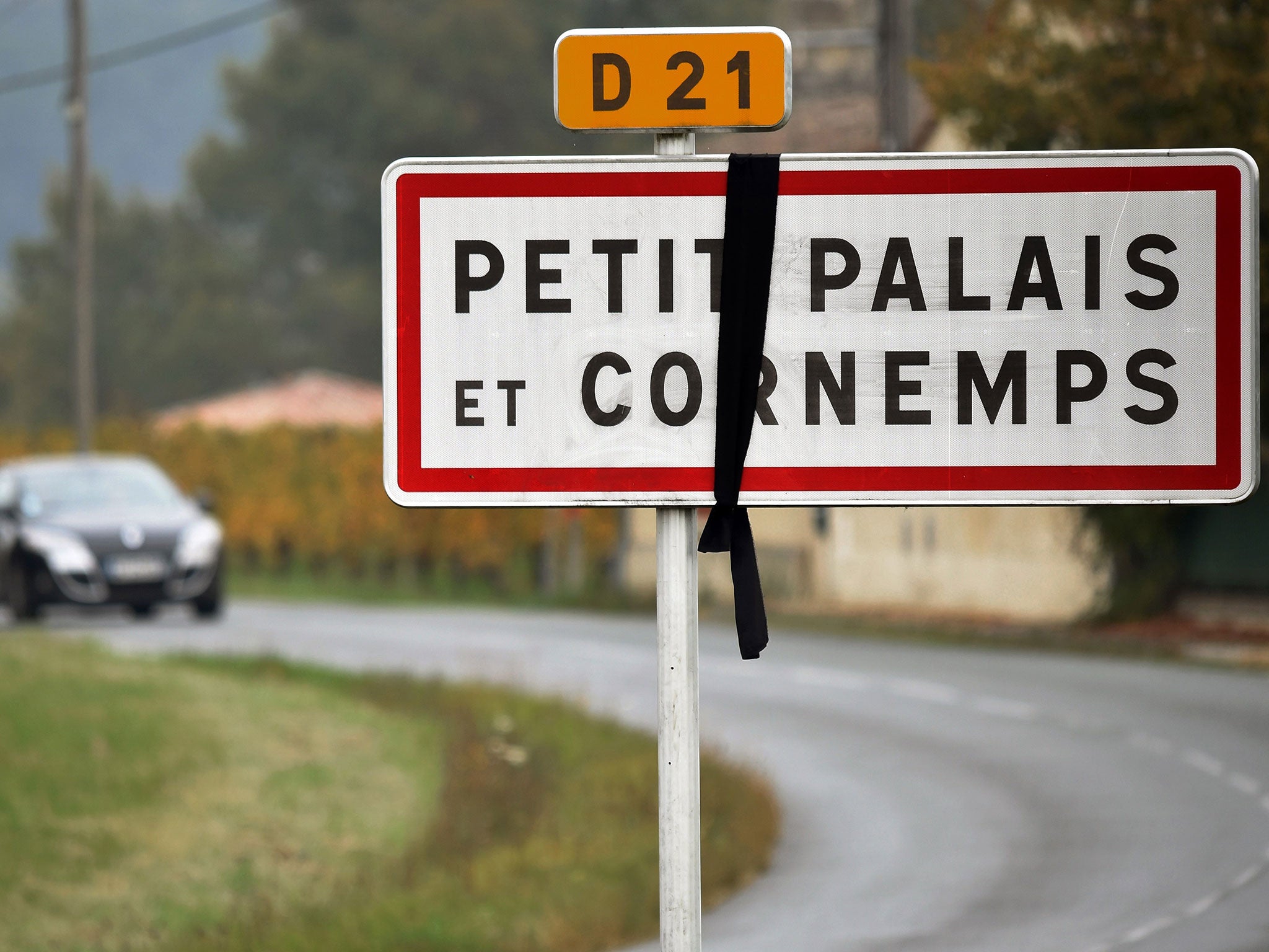 A black ribbon marks a road accident outside the town of Petit-Palais-et-Cornemps in south west France last year in which 43 people died