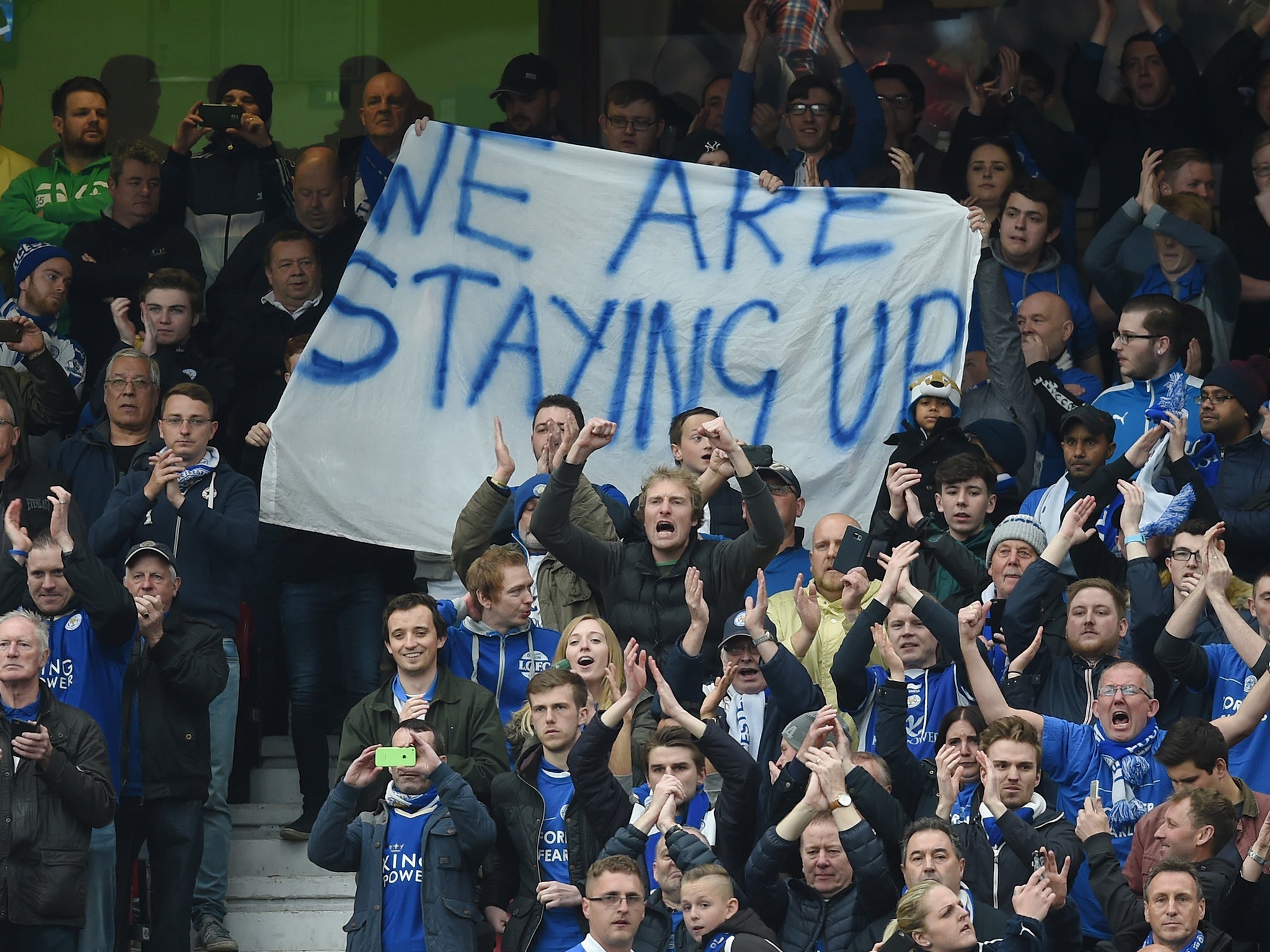 Leicester City fans and their banner at Old Trafford