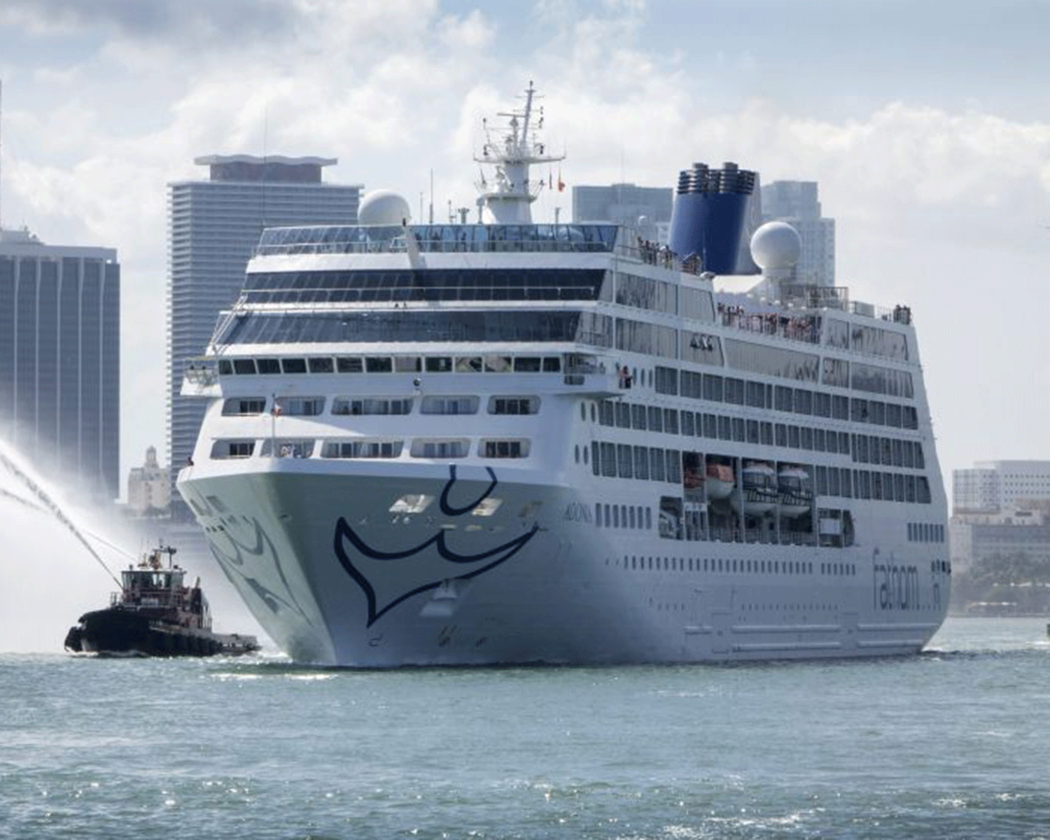 Cruise ship Adonia, from the new Carnival's Fathom line, sails Miami's port escorted by tugboats as it heads to Cuba, in Miami, Florida, USA, 01 May 2016.