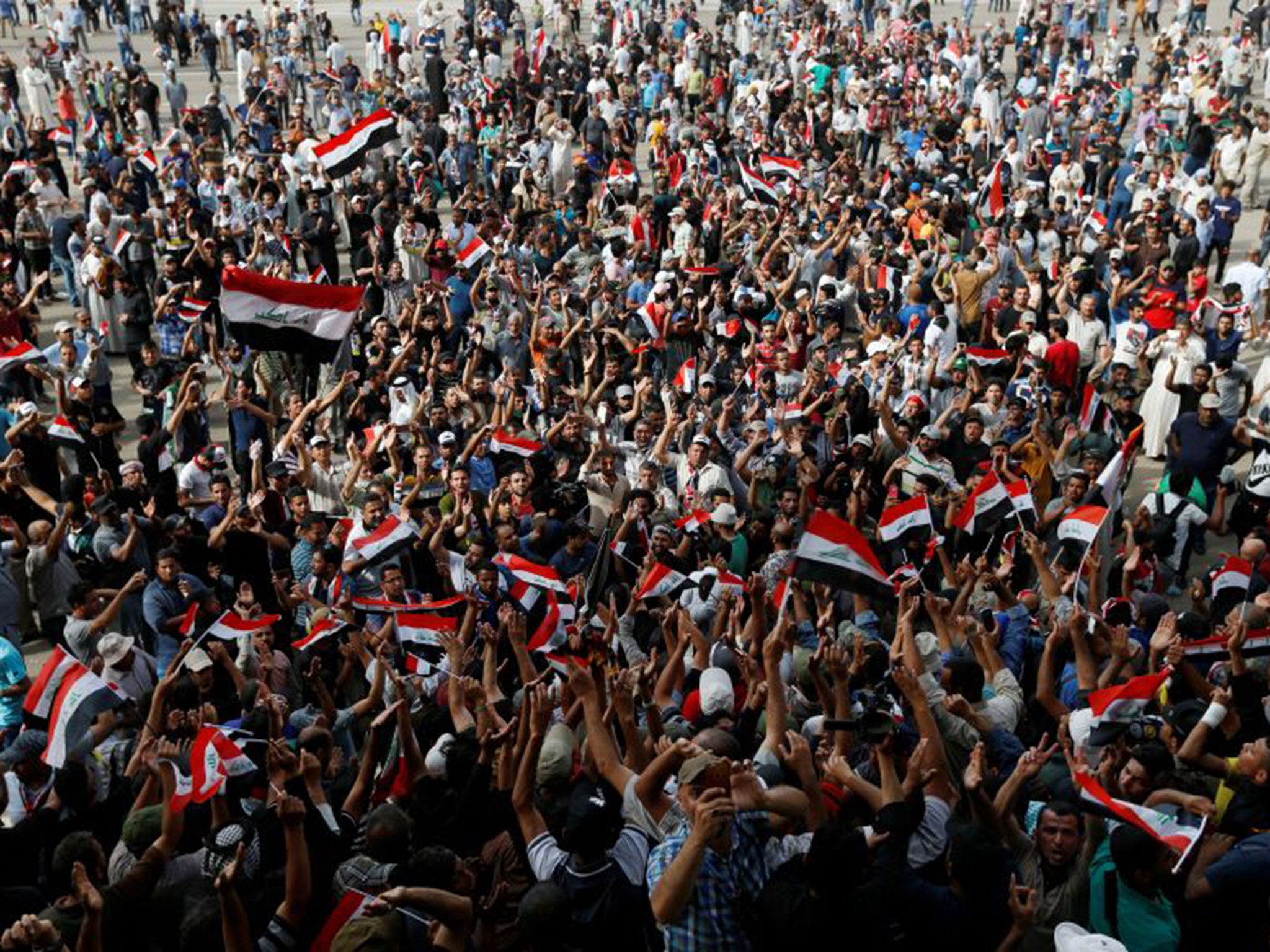 Followers of Iraqi Shi'ite cleric Moqtada al-Sadr stage a takeover of the Grand Festivities Square inside the Green Zone