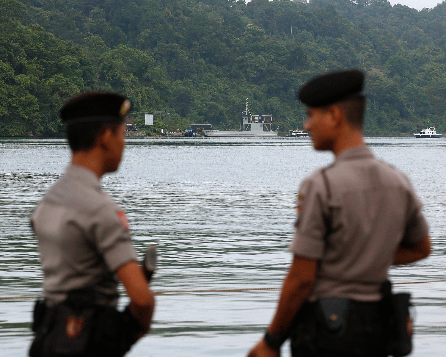 indonesian soldiers stand guard at the Nusa Kambanan island prison which is reportedly being prepared for firing squad executions.