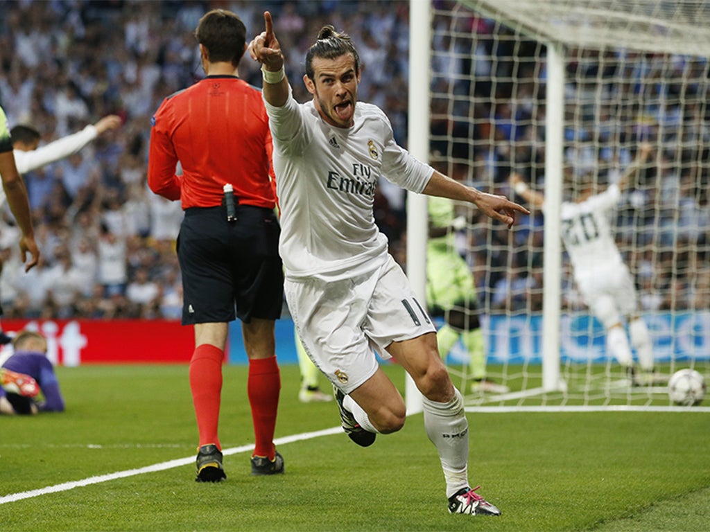 Gareth Bale celebrates after helping Real into the lead