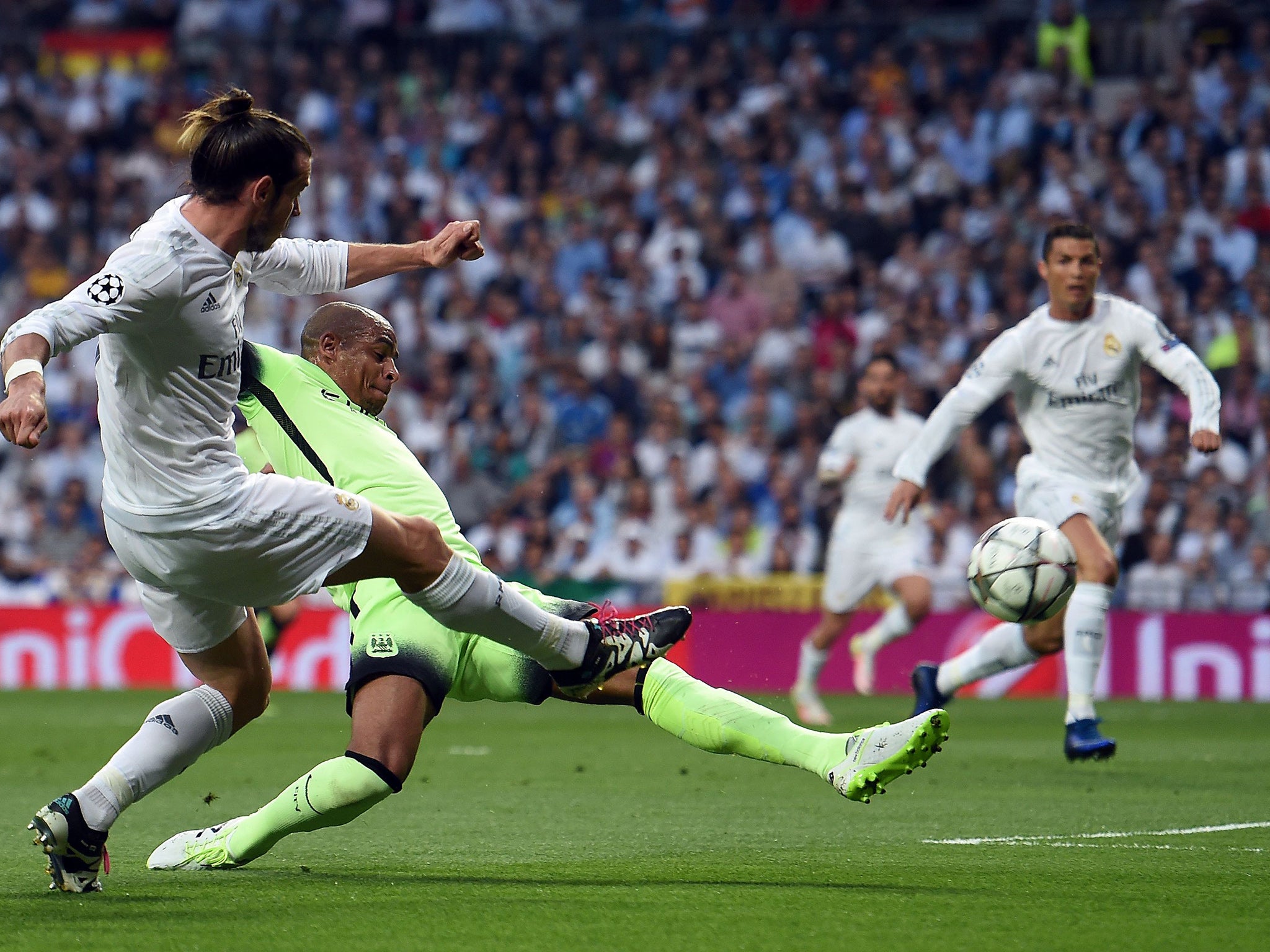 Fernando deflects Gareth Bale's effort into the back of the net