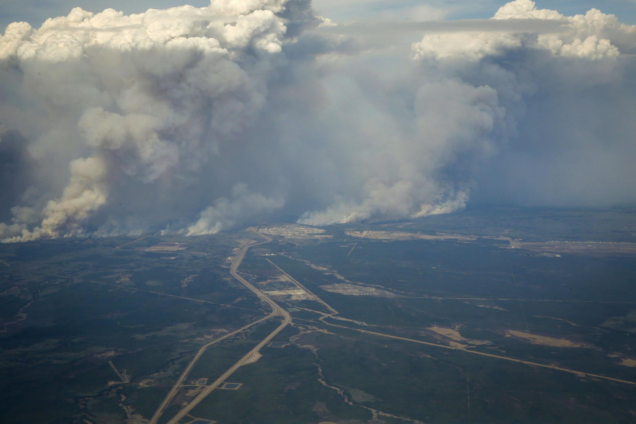 Officials said only weather can halt the fire's advance