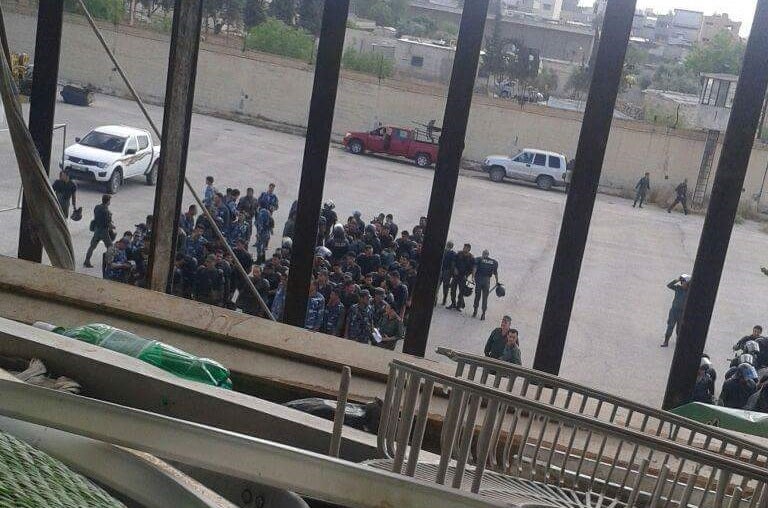 Sources within the prison allege that forces loyal to Bashar Al-Assad have fired tear gas into the prison and surrounded it with snipers