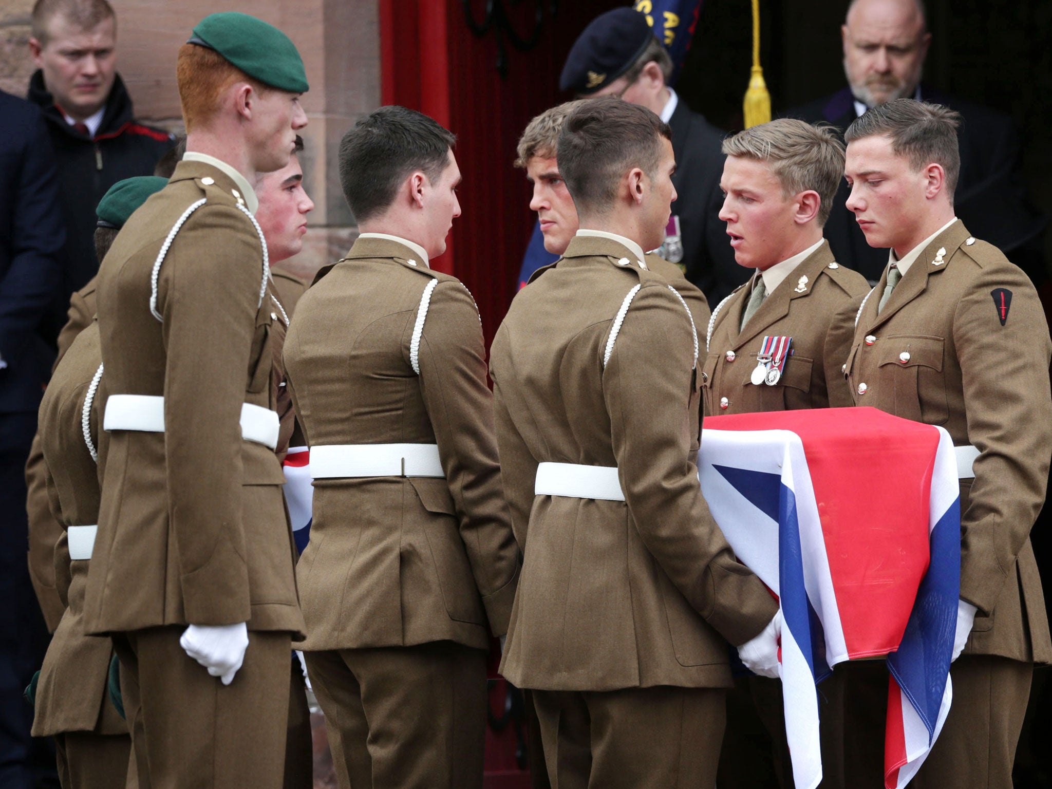 Military colleagues hold the coffin of Captain David Seath at St Margaret's RC Memorial Church in Dunfermline, Scotland