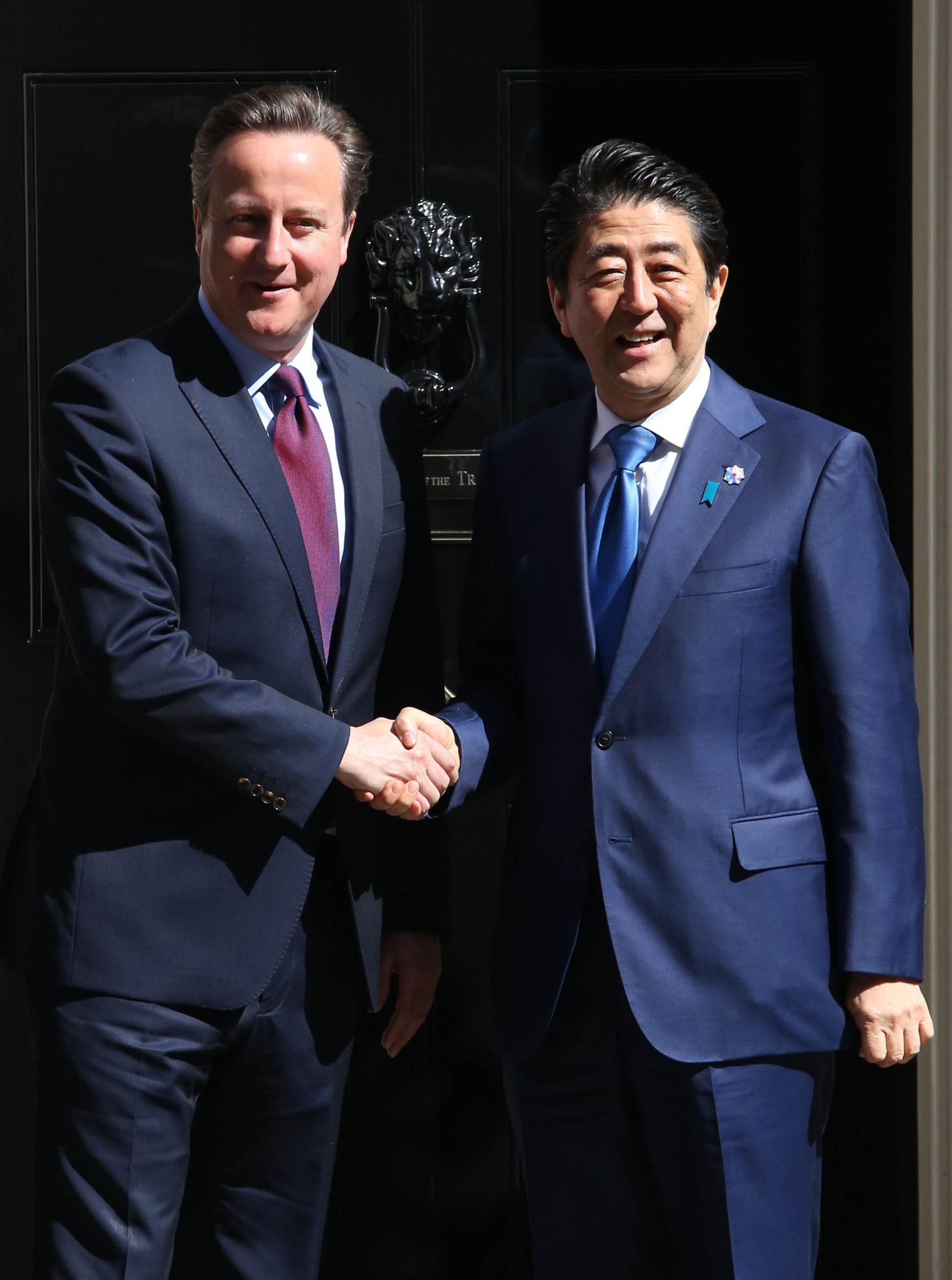 David Cameron greets Japanese Prime Minister Shinzo Abe outside Number 10 Downing Street