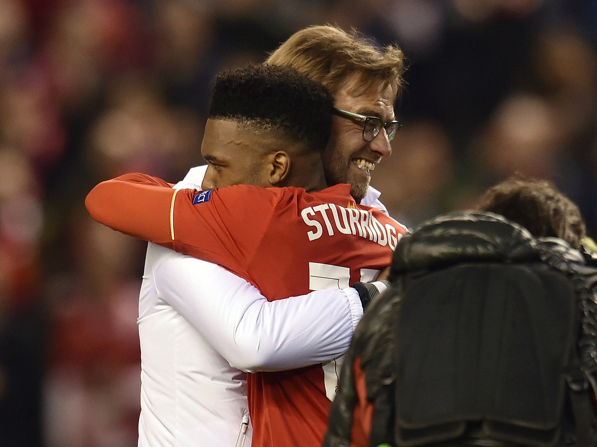 Jurgen Klopp celebrates semi-final victory over Villarreal with Daniel Sturridge