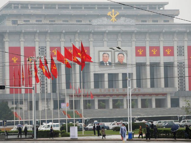 A policeman controls the traffic in front of the April 25 House of Culture, venue of the Workers' Party of Korea (WPK) congress in Pyongyang