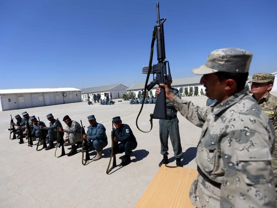 Afghan policemen participate in a training session